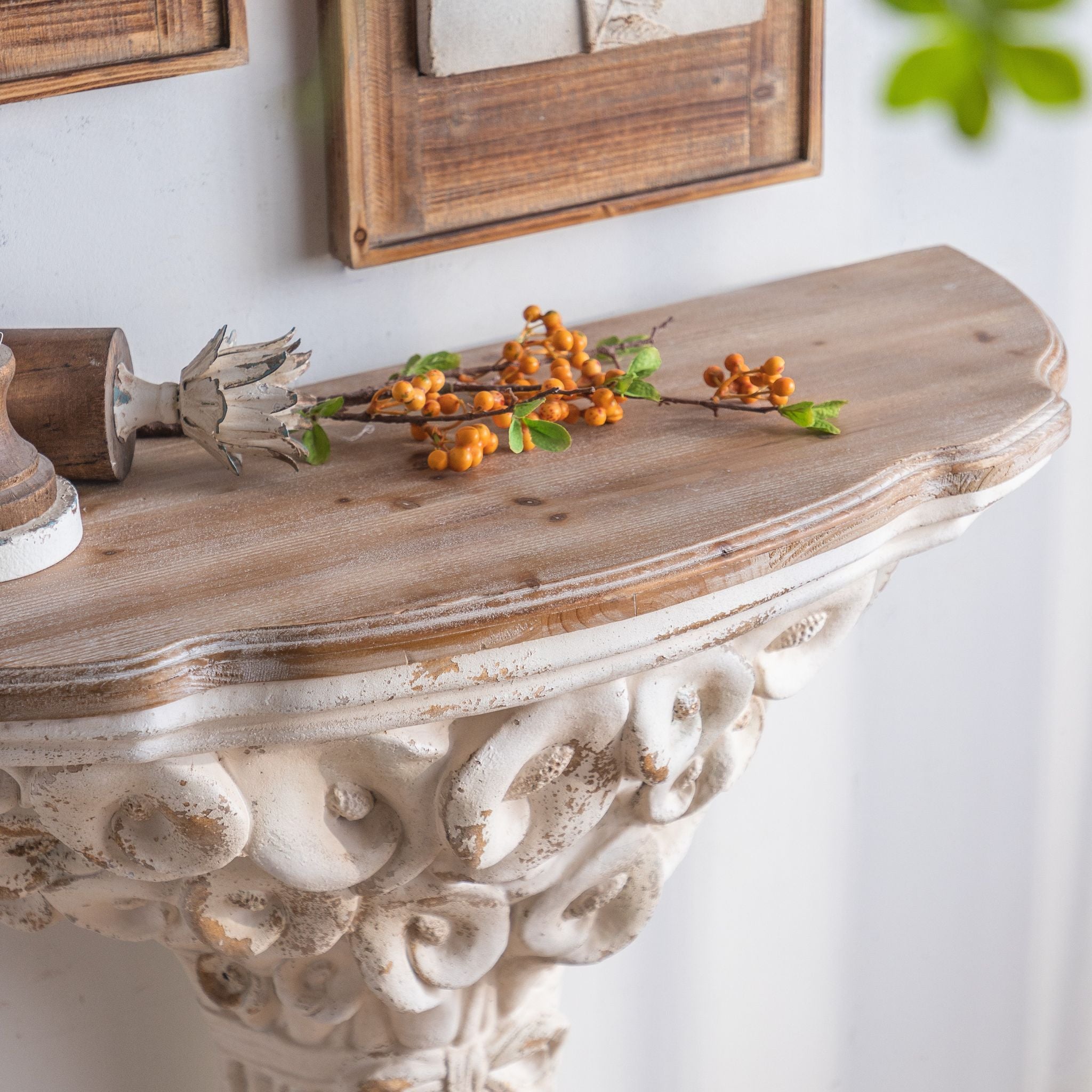 Close-up of the natural timber demilune top edge of the Celestine console