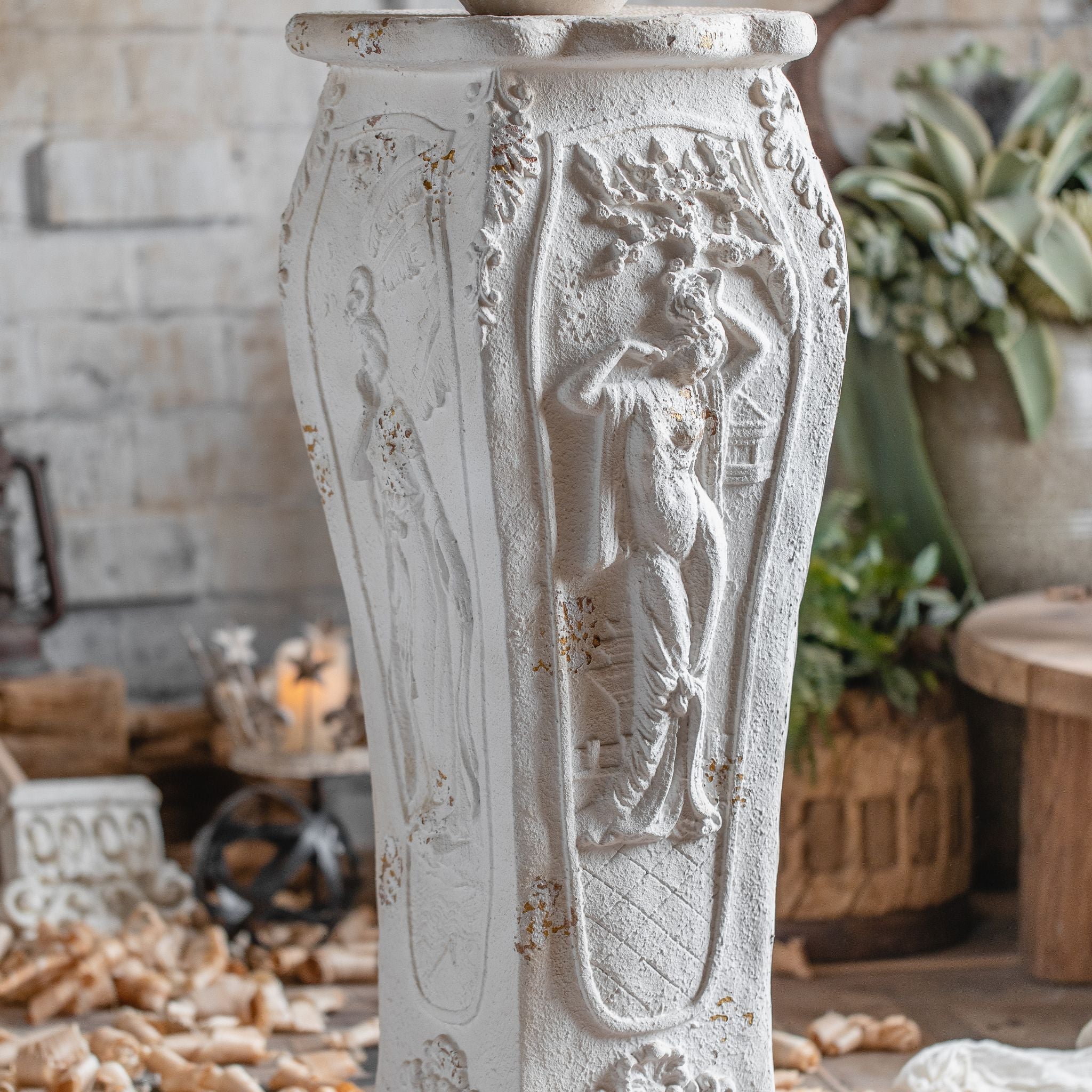 Cadiz pedestal relief detail with scroll feet