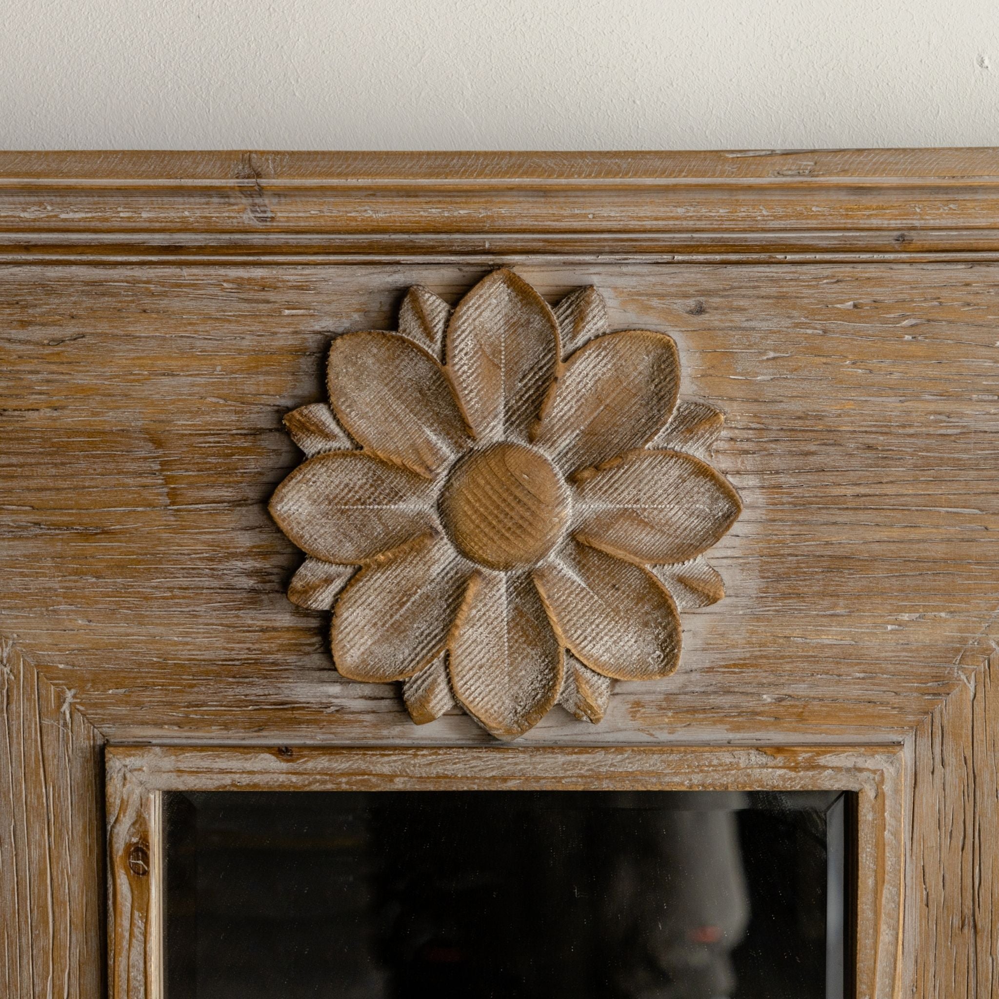 Rosina trumeau mirror carved flower rosette close up in the head panel