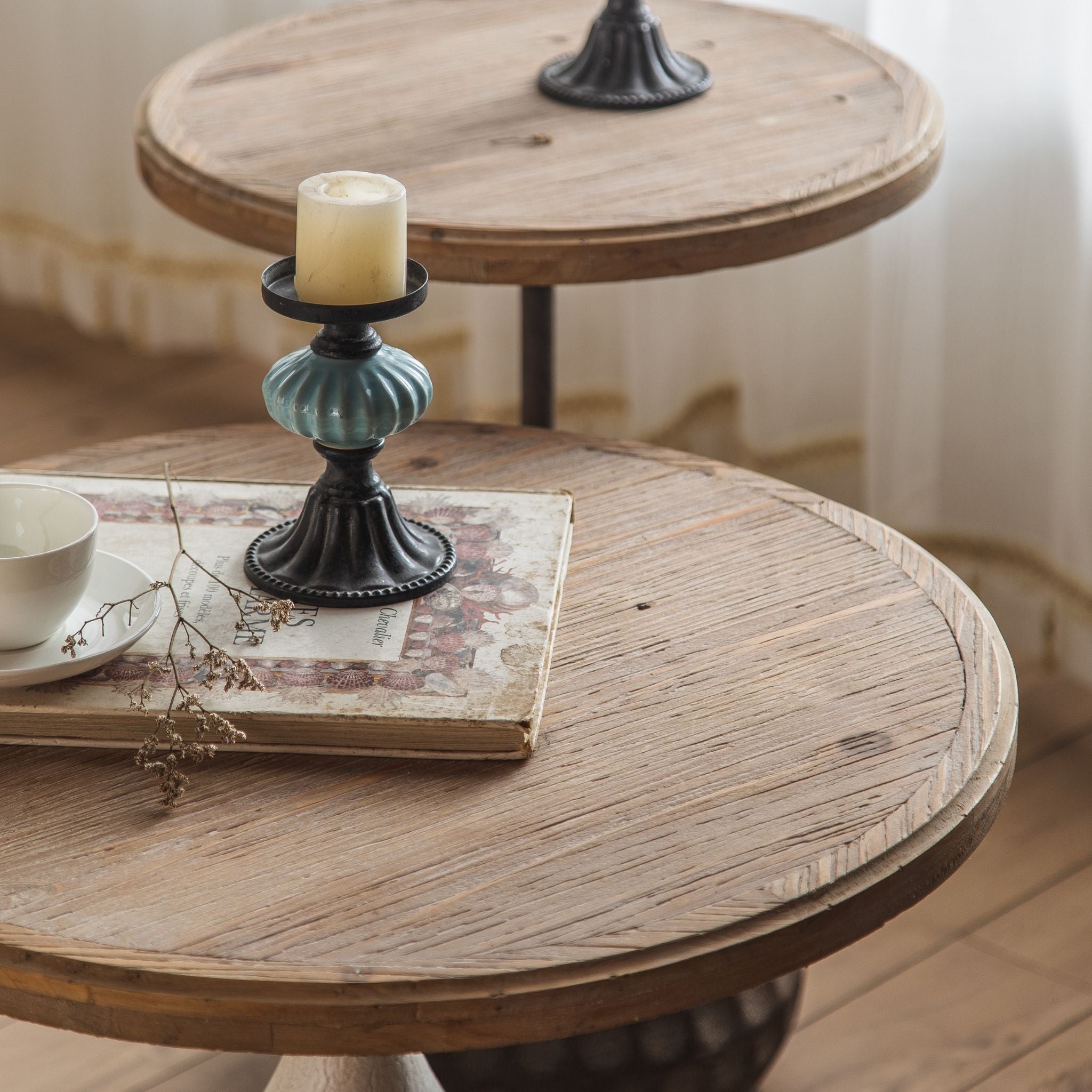 Tullia round side table styled in a furnished room setting