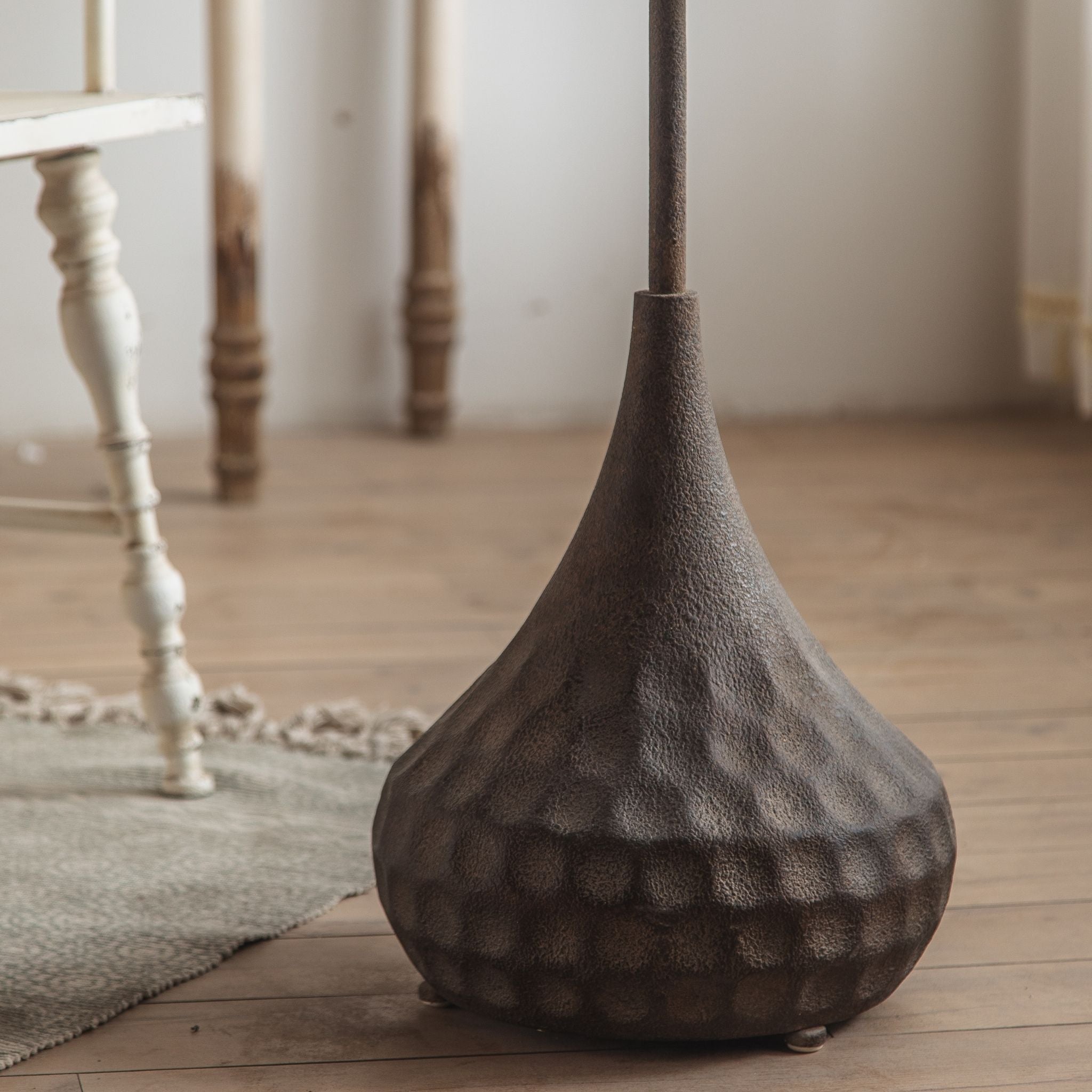 Vanna side table hammered teardrop base close up in aged black