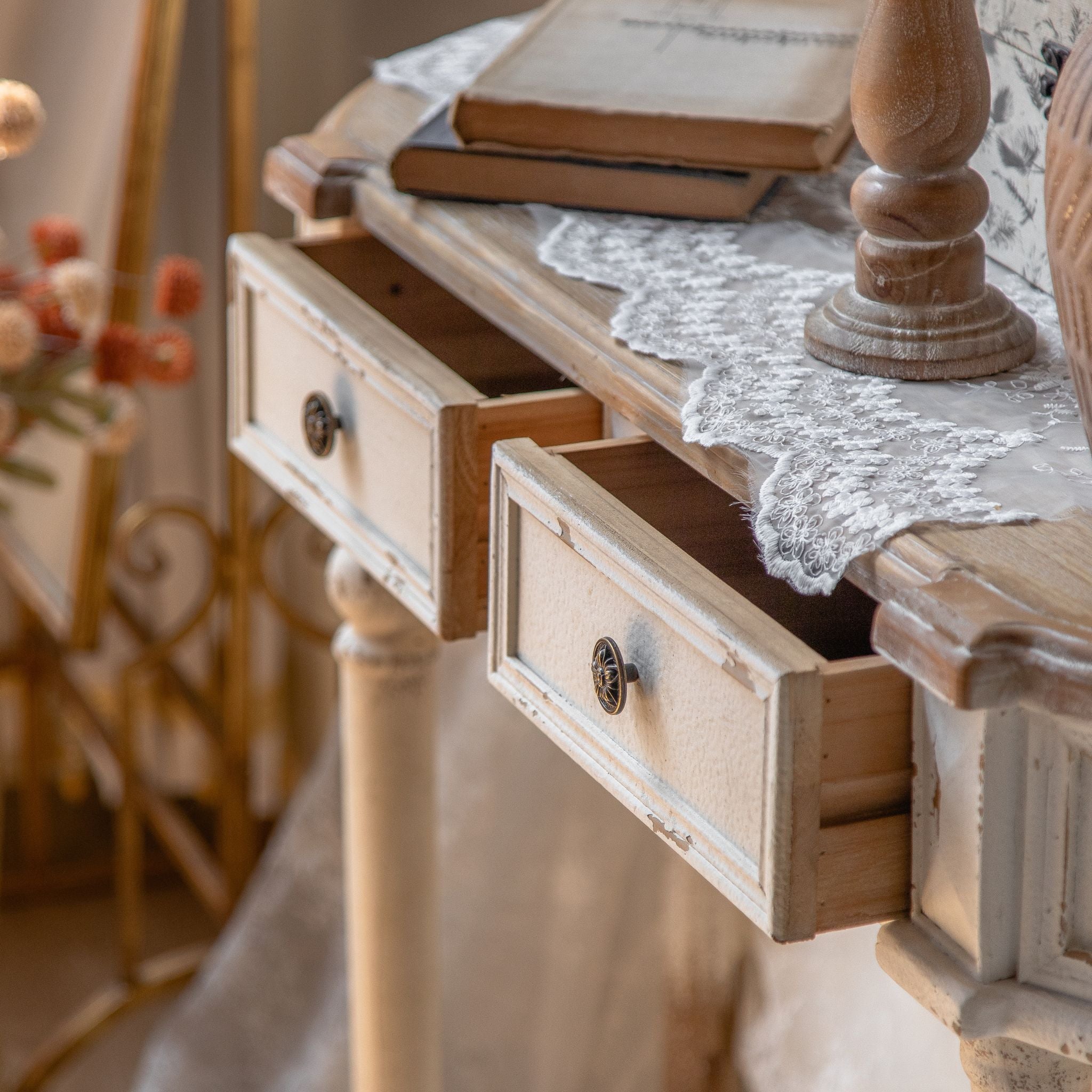 Talia console drawers open showing timber drawer boxes and rosette knobs