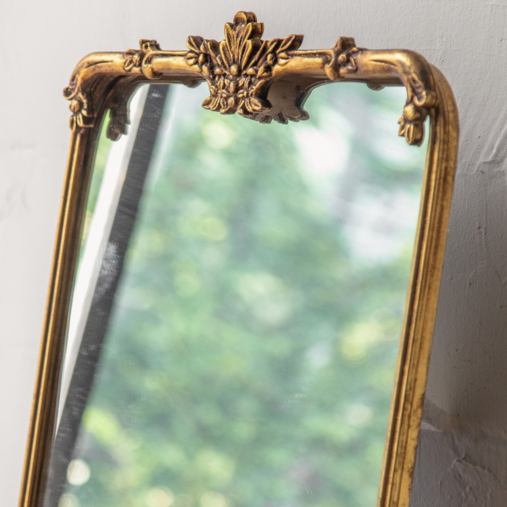 Sorrento cheval mirror half moon trestle feet and gold frame base detail