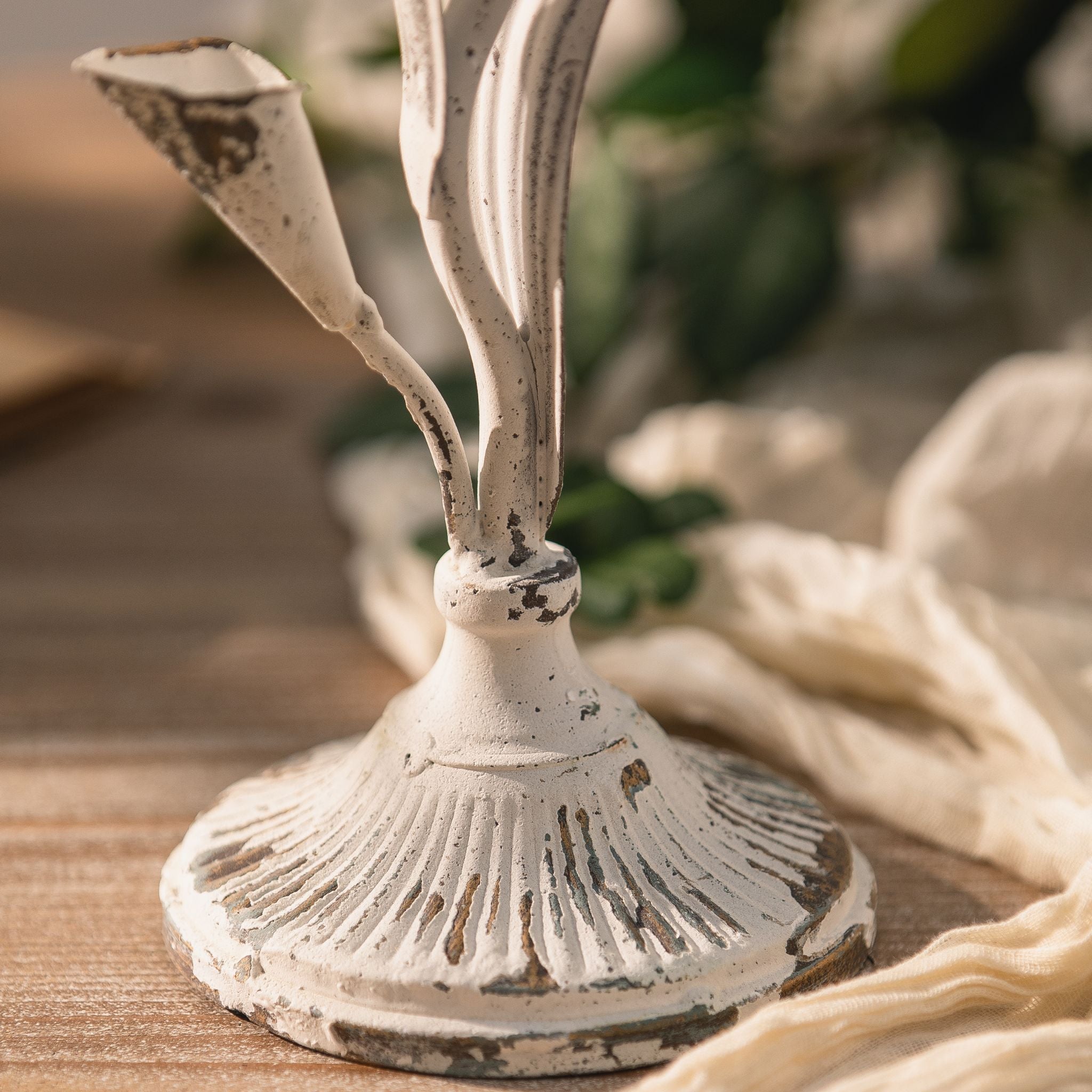 Close view of the petal cup and curved leaves on the Siena candle holder