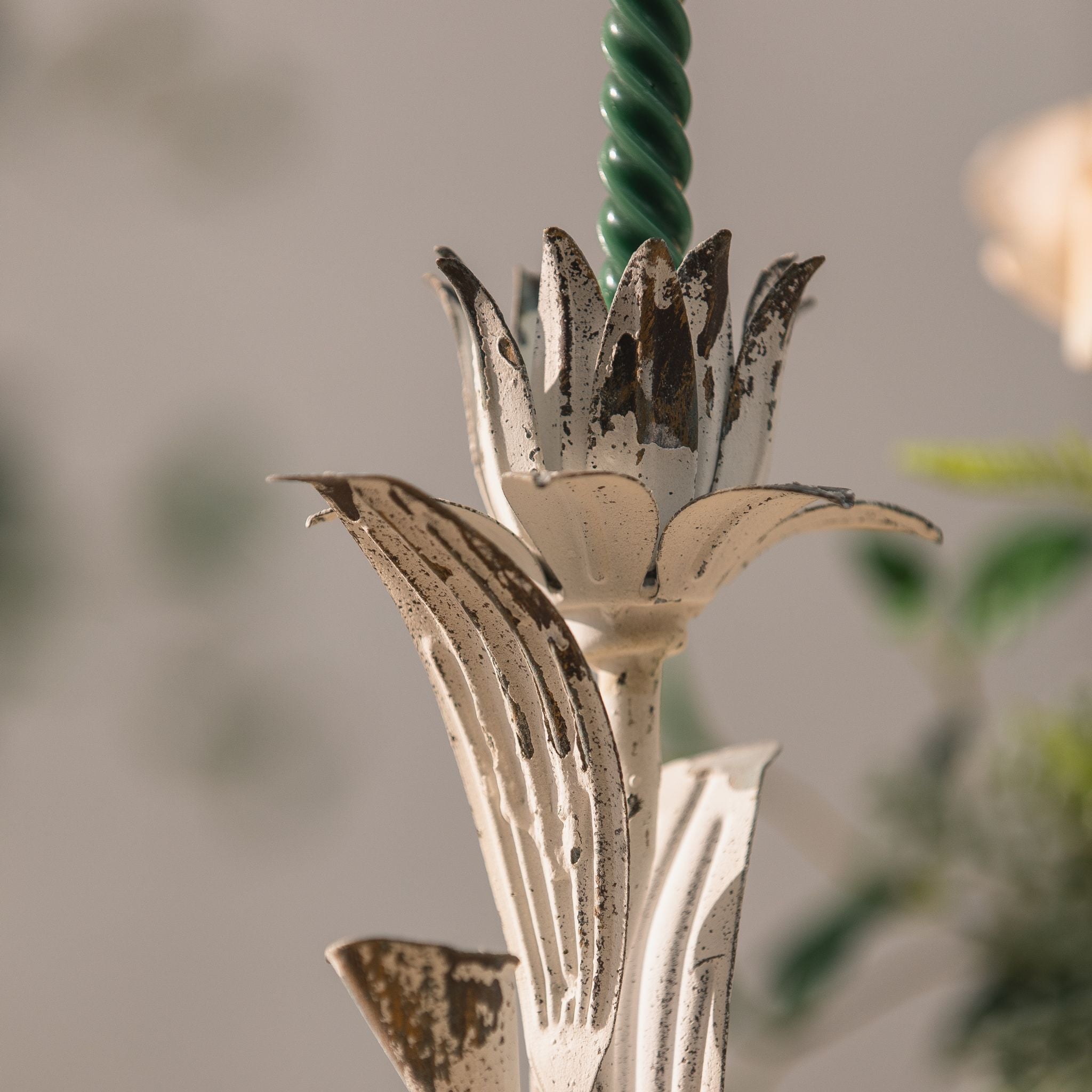 Close view of the petal cup and curved leaves on the Silvio candle holder