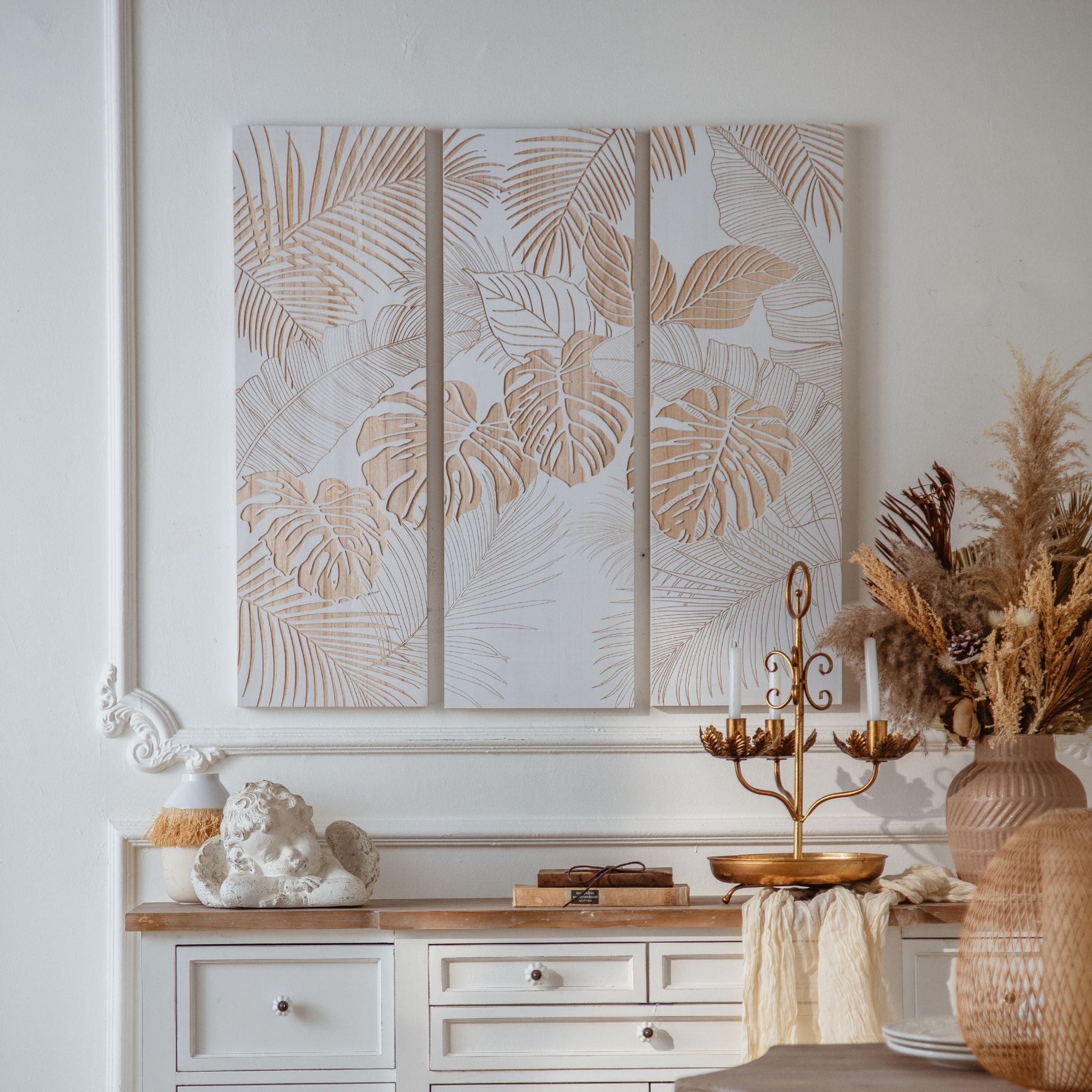 Sole three panel carved wall art with white ground and natural timber leaf design