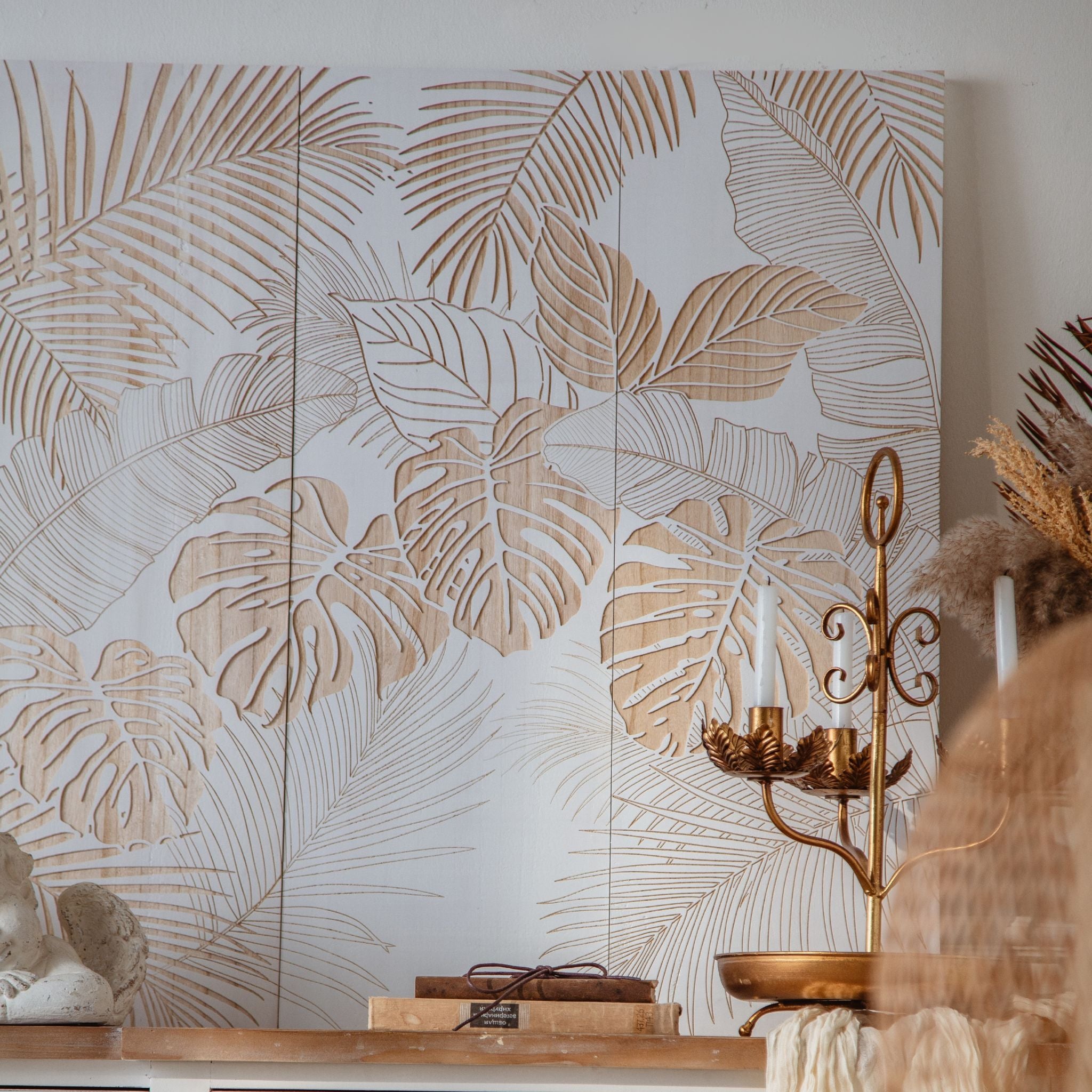 Sole carved leaf wall panels styled in a light living room