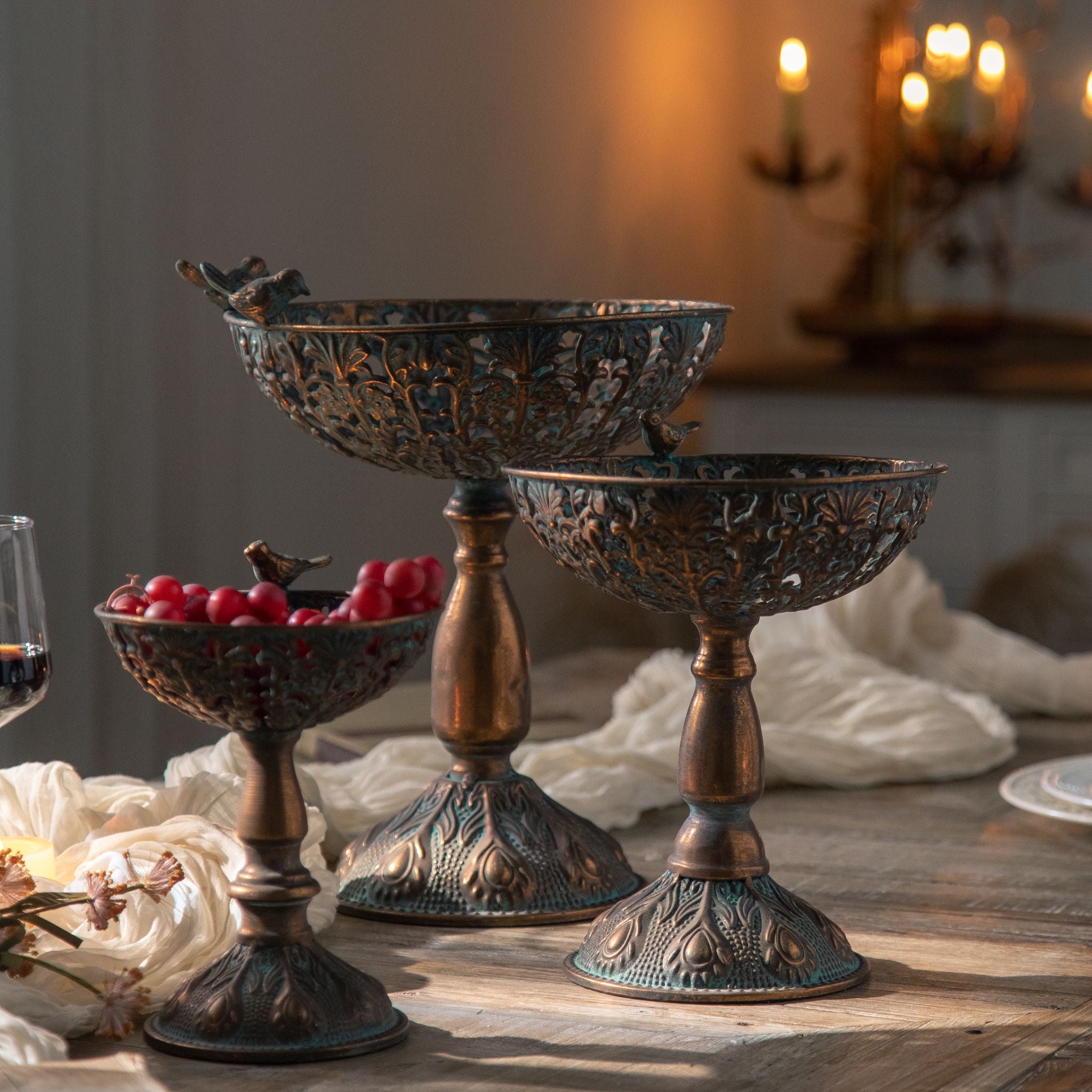 Santo pedestal bowl styled on a timber dining table with candlelight
