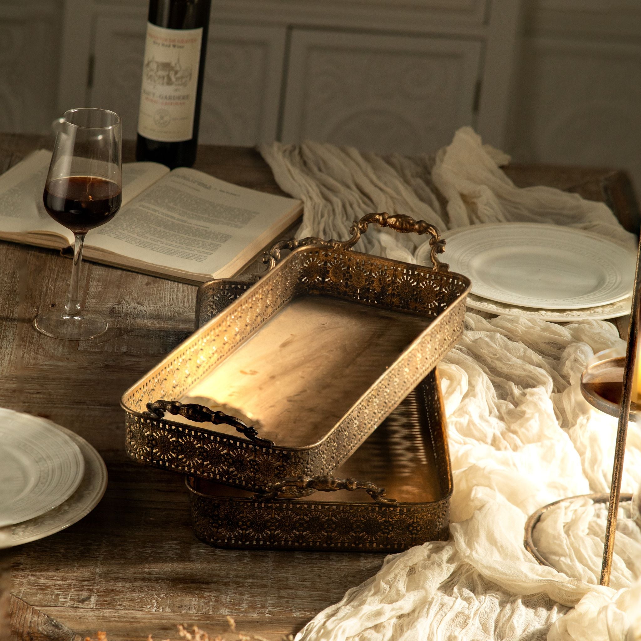 Close view of the pierced filigree gallery side and cast handle on the Ravello tray