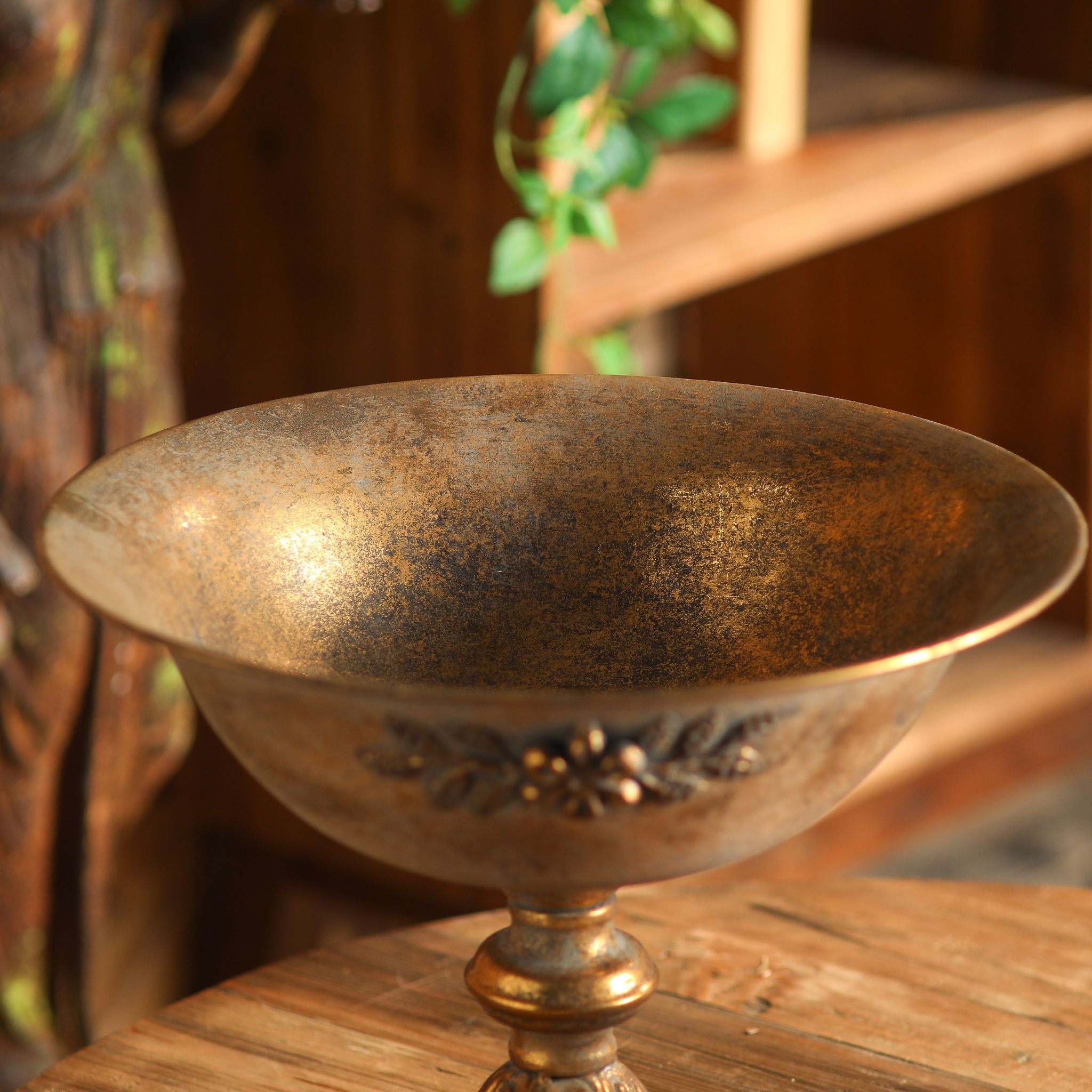 Close view of the acanthus pressed foot and Greek key border on the Orlando compote
