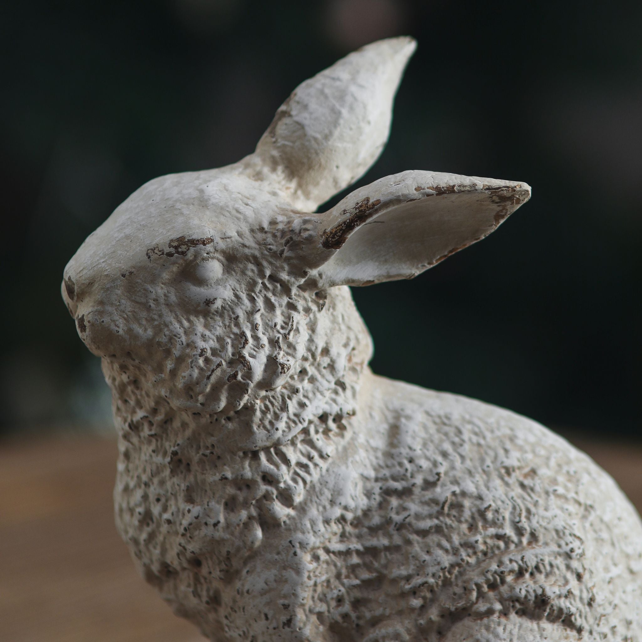 Dante rabbit sculpture styled on a table in a festive room