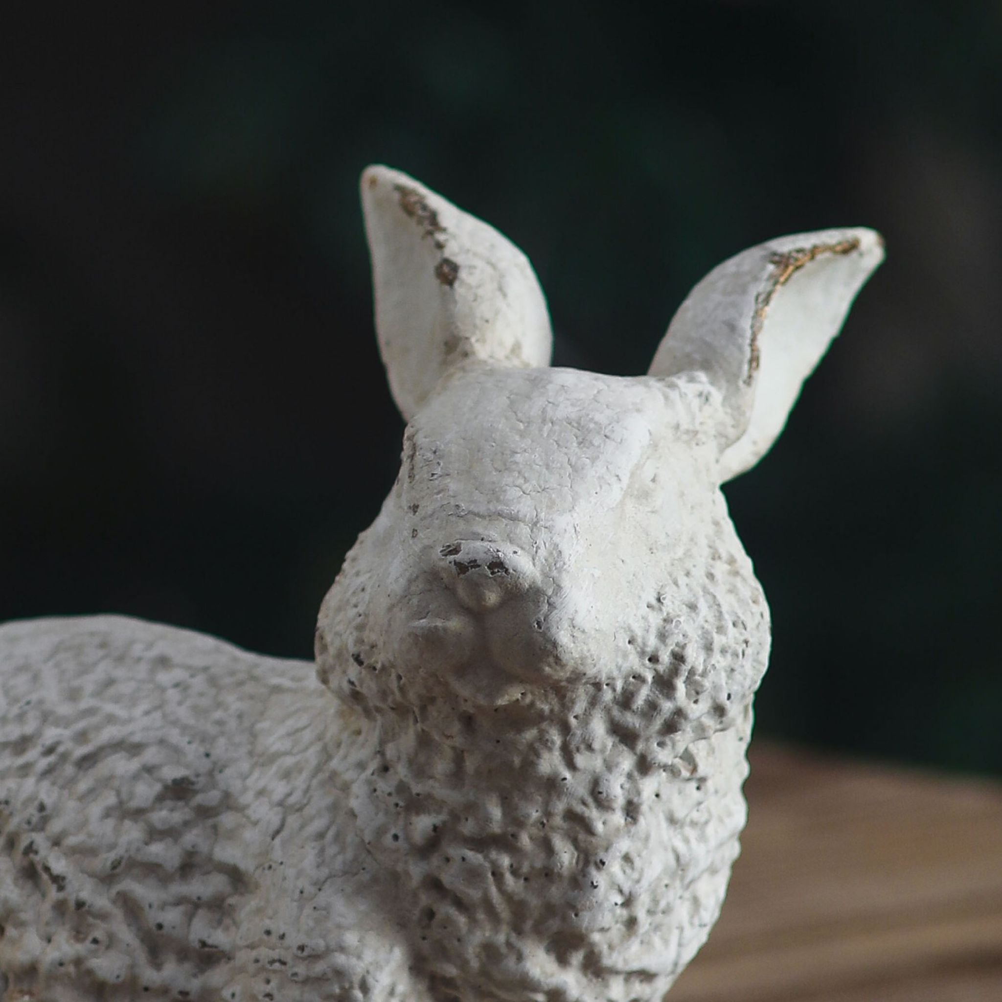 Delia rabbit sculpture with the rabbit family gathered on a table