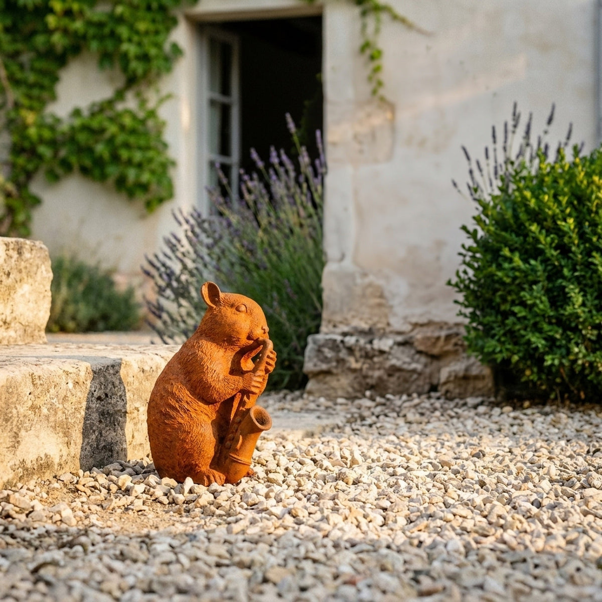 Bertie rust cast iron dormouse statue playing a saxophone, on gravel