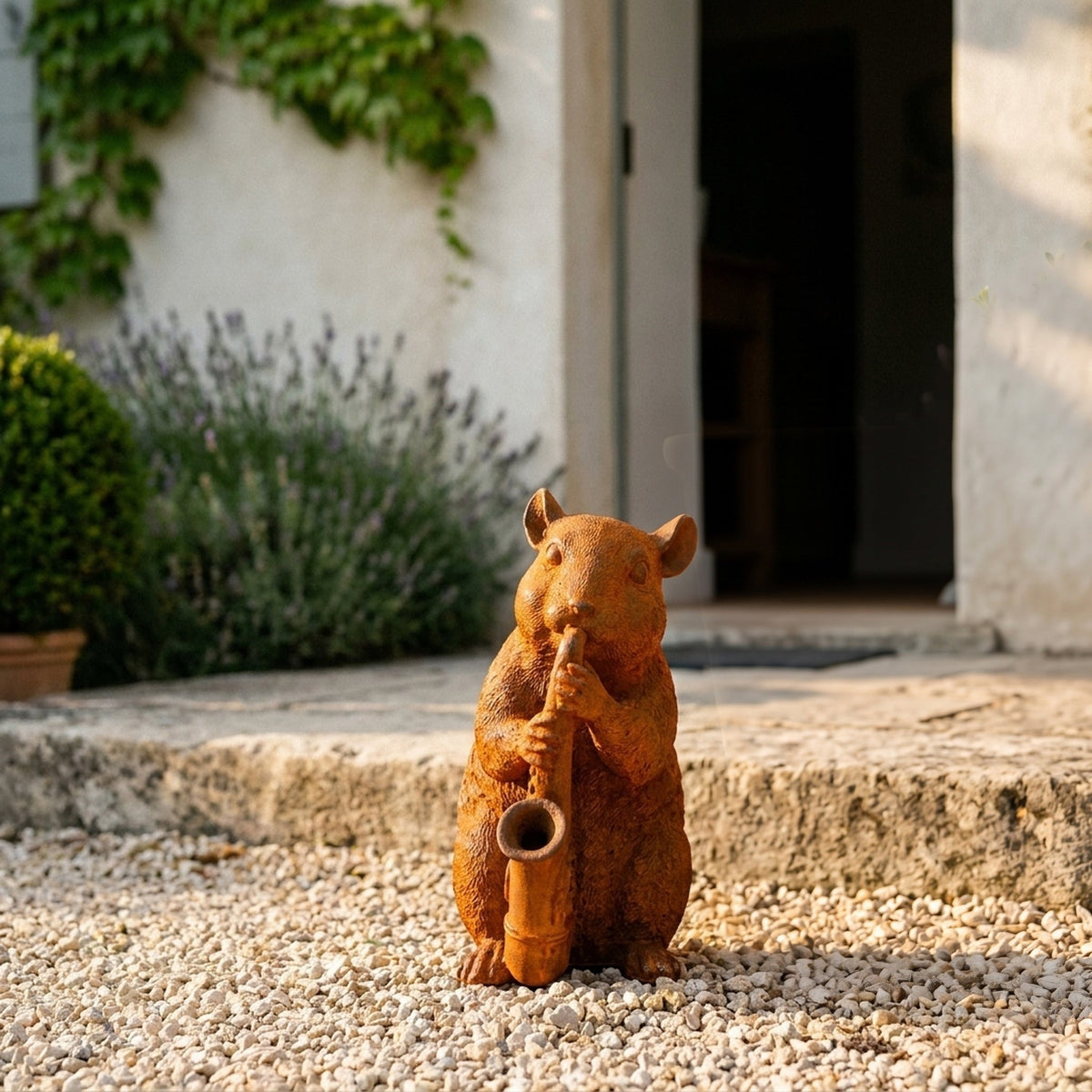 Bertie dormouse statue with a saxophone three quarter view in a provencal courtyard