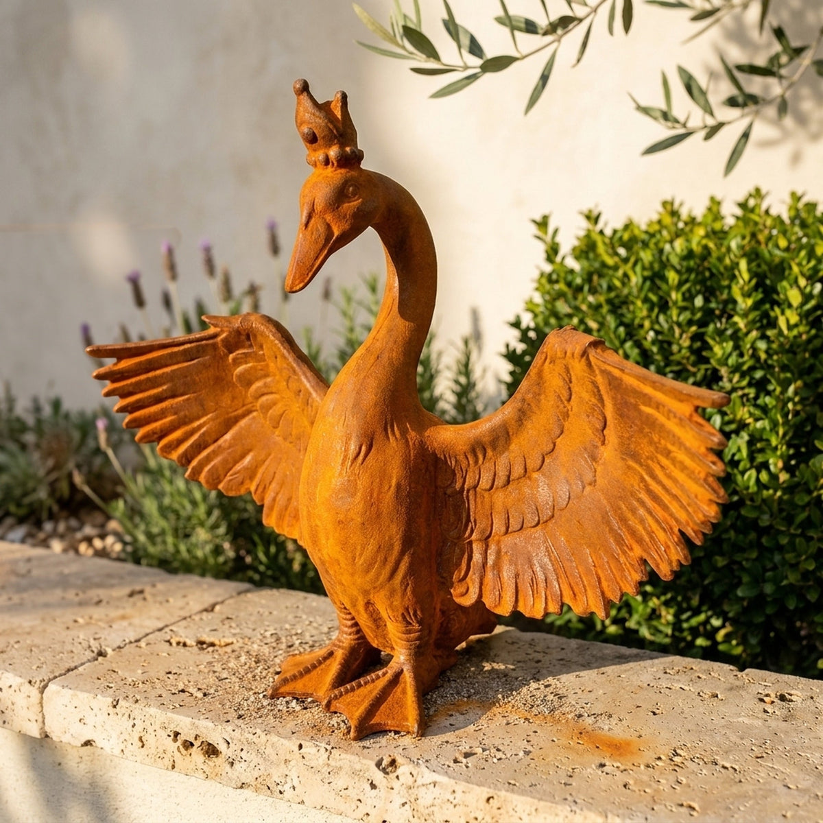 Princess Evangeline crowned goose statue front view on a limestone step