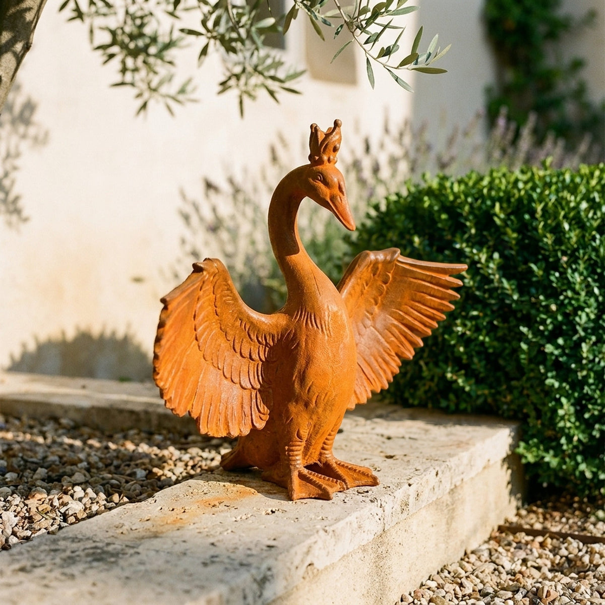 Princess Evangeline crowned goose statue showing the raised wings and beaded crown