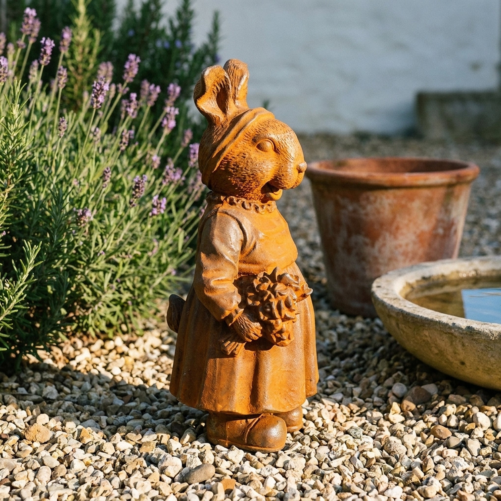 Miss Clover rabbit statue side view showing the gathered skirt and boots
