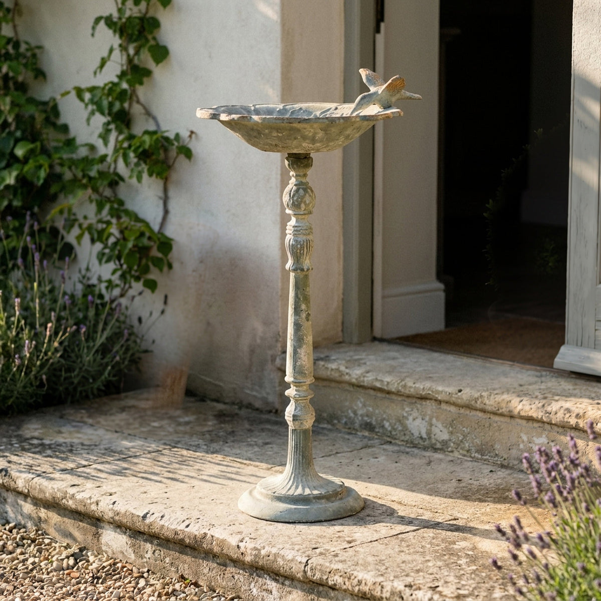 The Willowmere Grey pedestal bird feeder front view showing the full height and finish