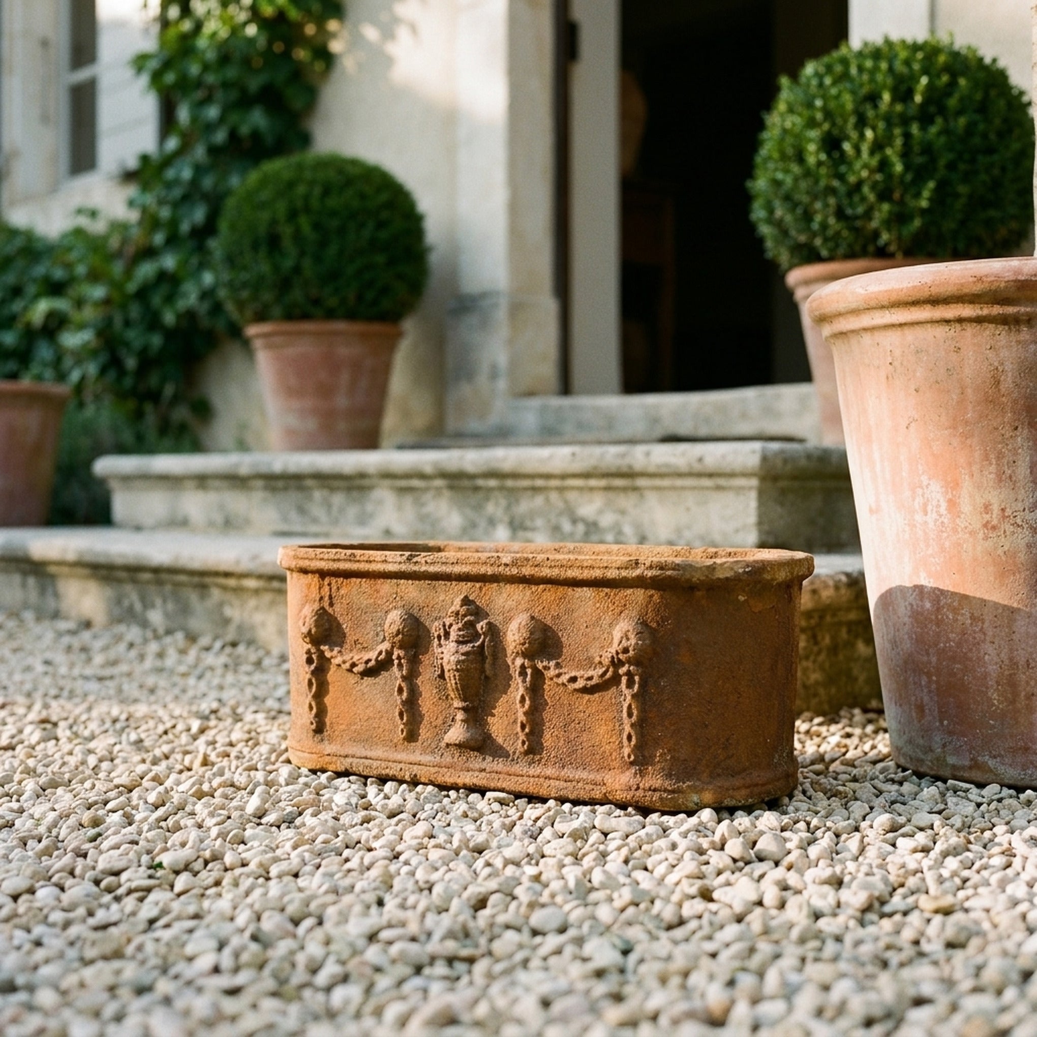 The Heritage Planter Rustic cast iron trough planter front view showing the full height and finish