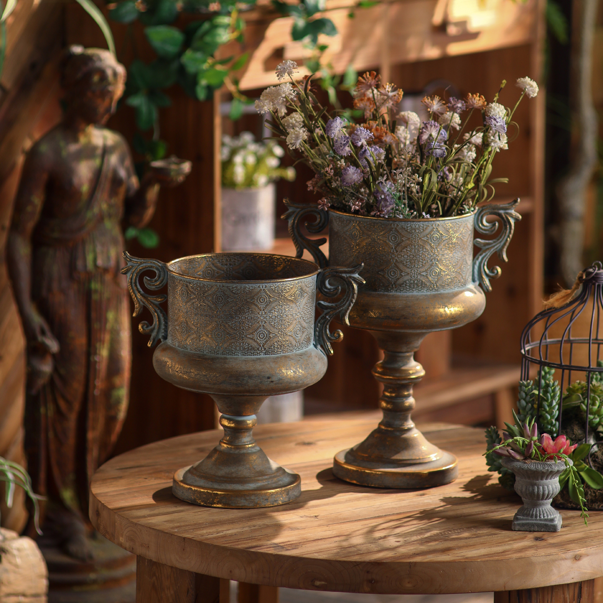 Mistral and Mykonos pair on a round timber table with the embossed lace band in light