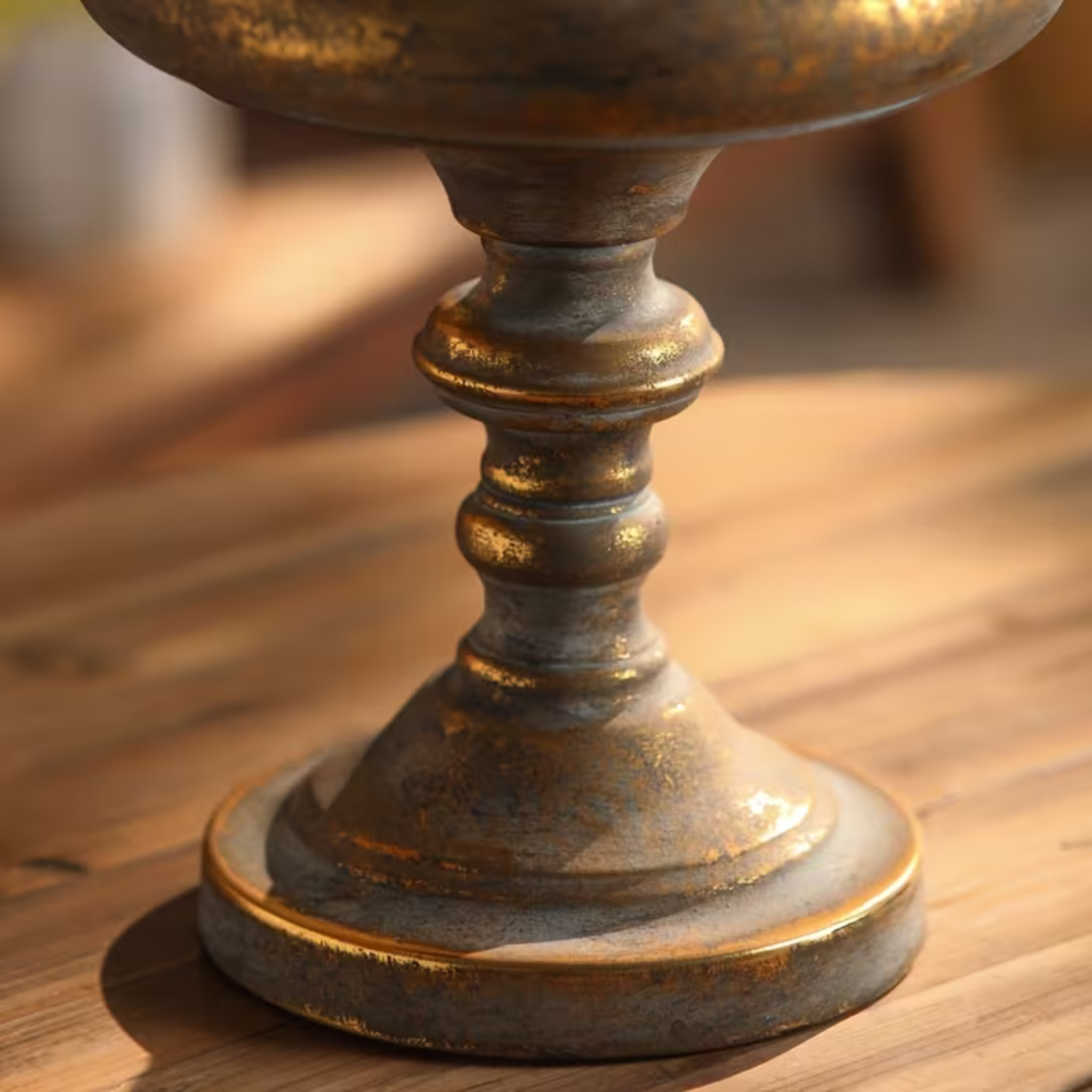 Mykonos urn detail of the turned pedestal foot and gold-edged base