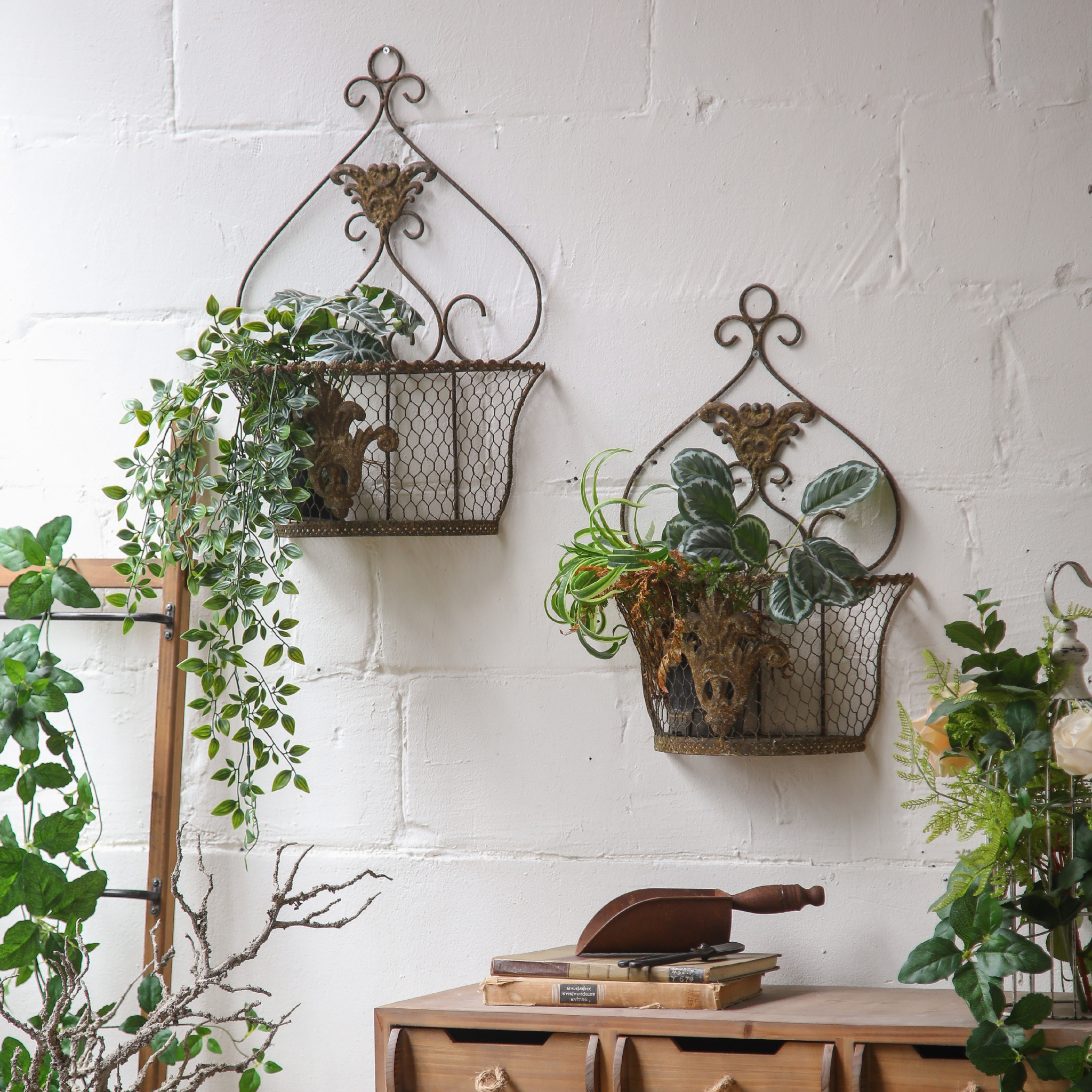Carmen and Como wall baskets styled with trailing greenery