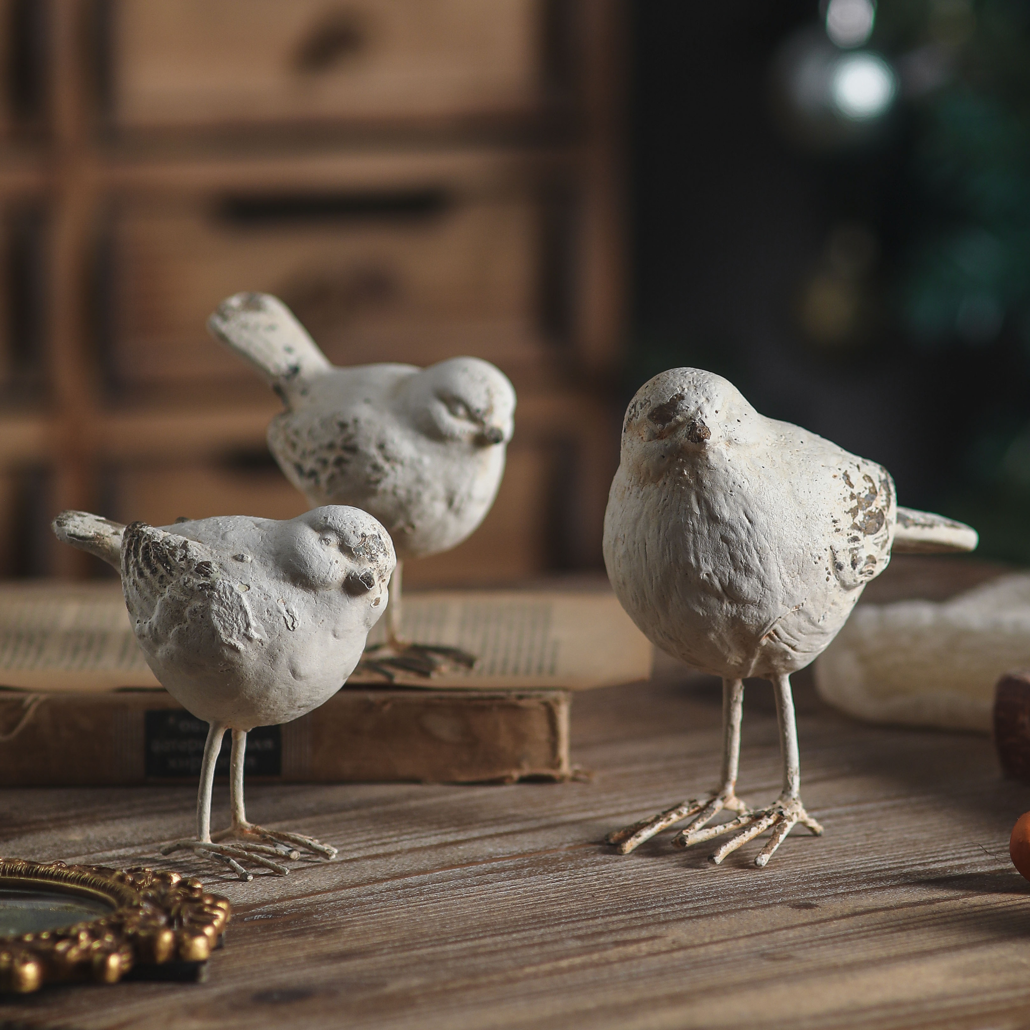 Gia bird trio grouped with the three poses facing different ways