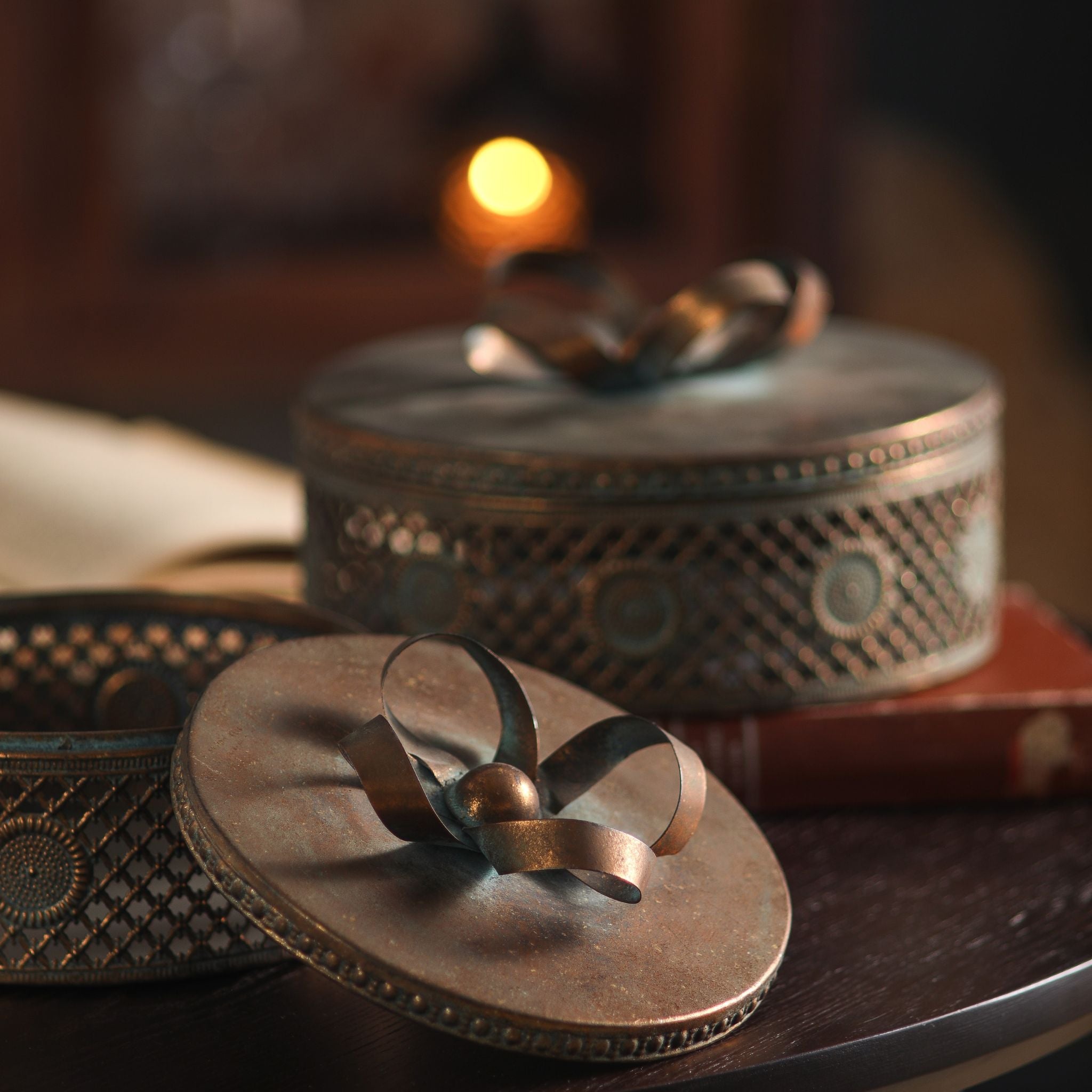 Alba box with the lid off, showing the bow detail and the second box behind.
