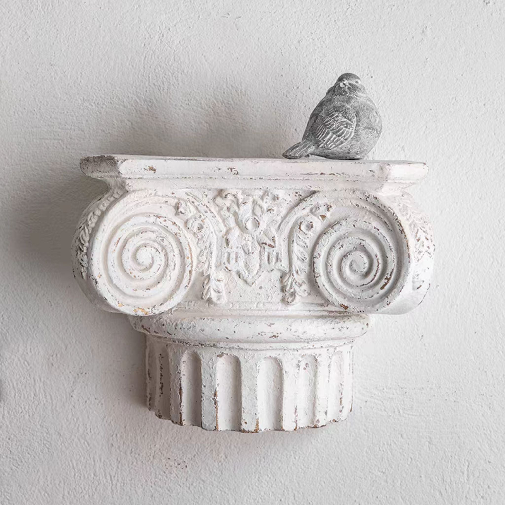 Aline French Provincial corbel wall shelf in distressed white, Ionic capital with twin scrolls and fluted base. Hero.