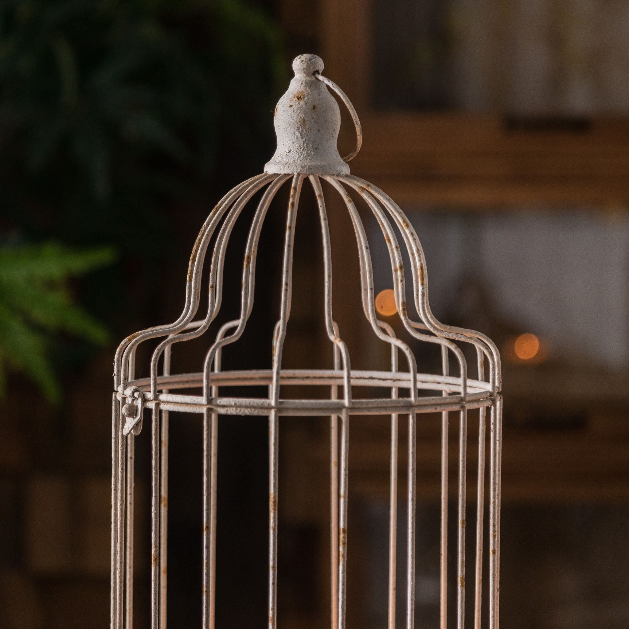 Bernard birdcage candle lantern detail showing domed wire crown and side latch door