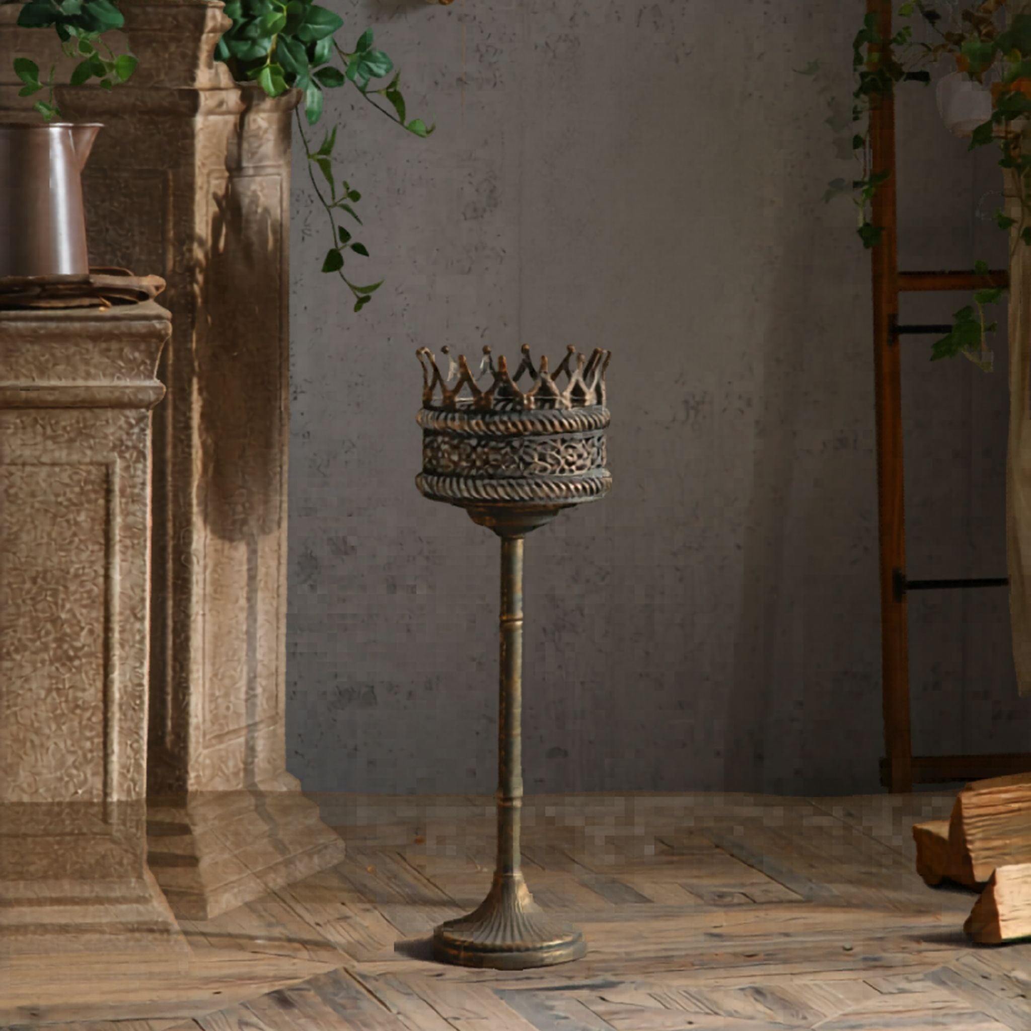 Solange crown-topped pedestal planter stand in aged metal, with a pierced filigree band on a slim column