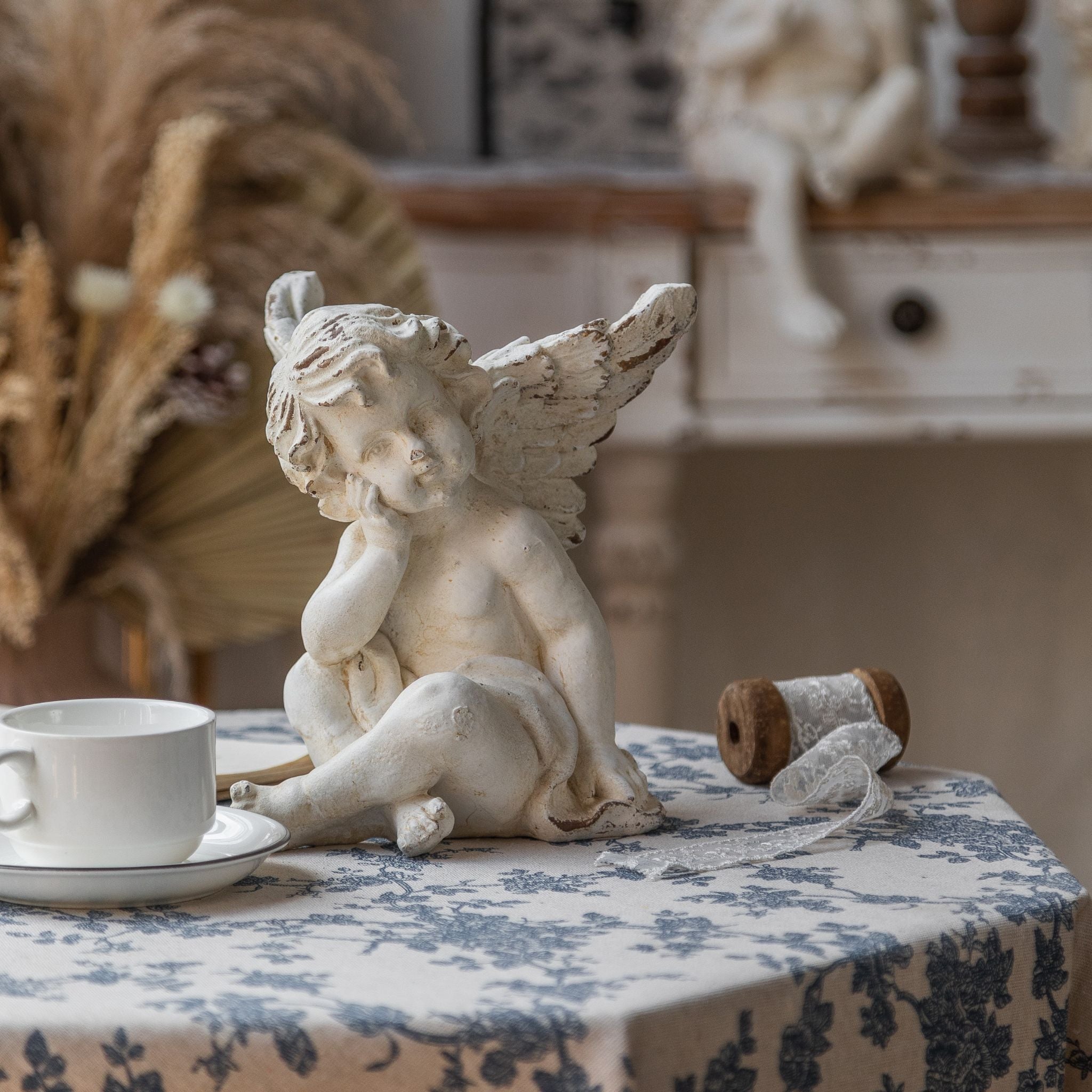 Cupidon French Provincial Sitting Cherub Sculpture, Antique Whitewashed Magnesia 21cm