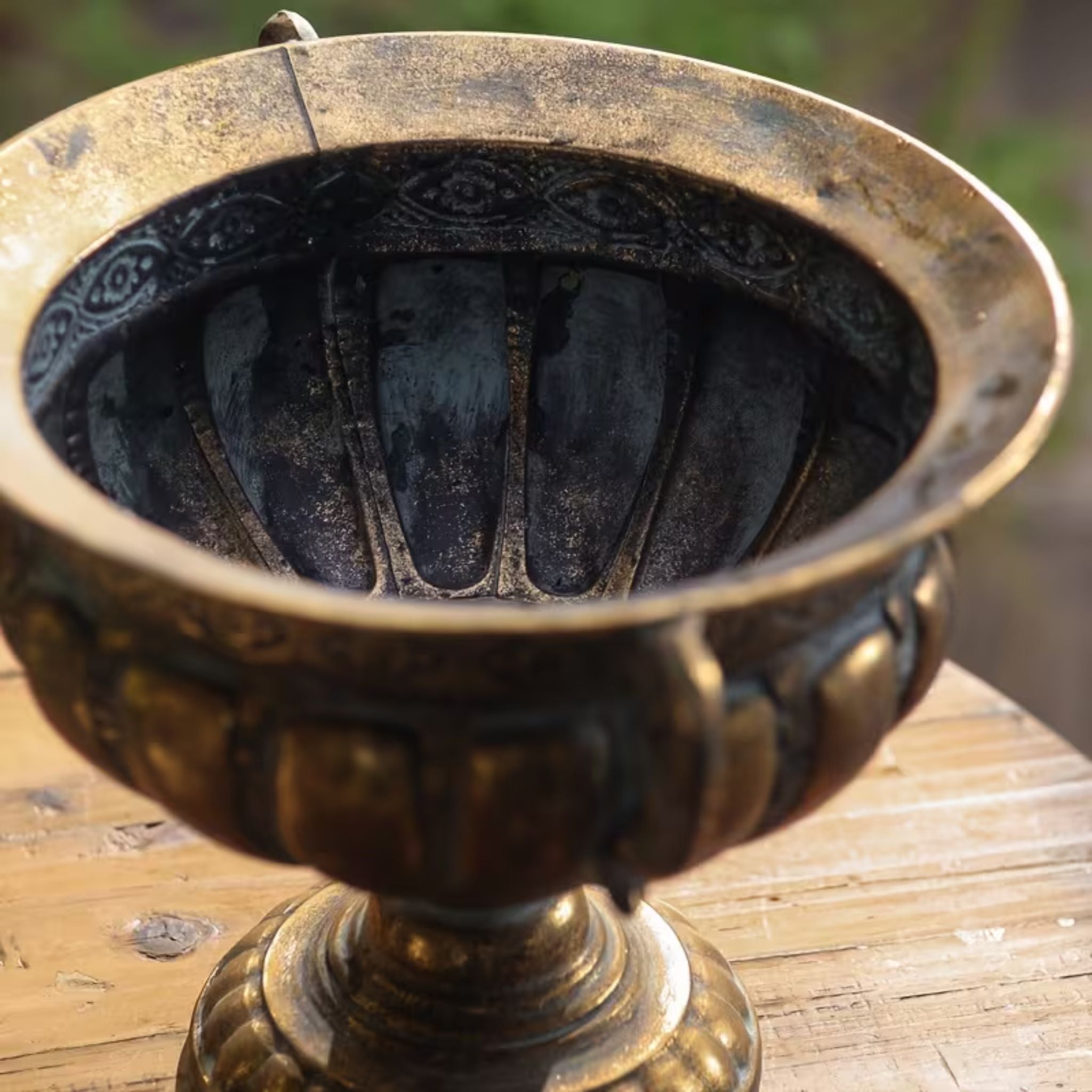 Dominique footed urn planter shown empty, looking into the fluted bowl