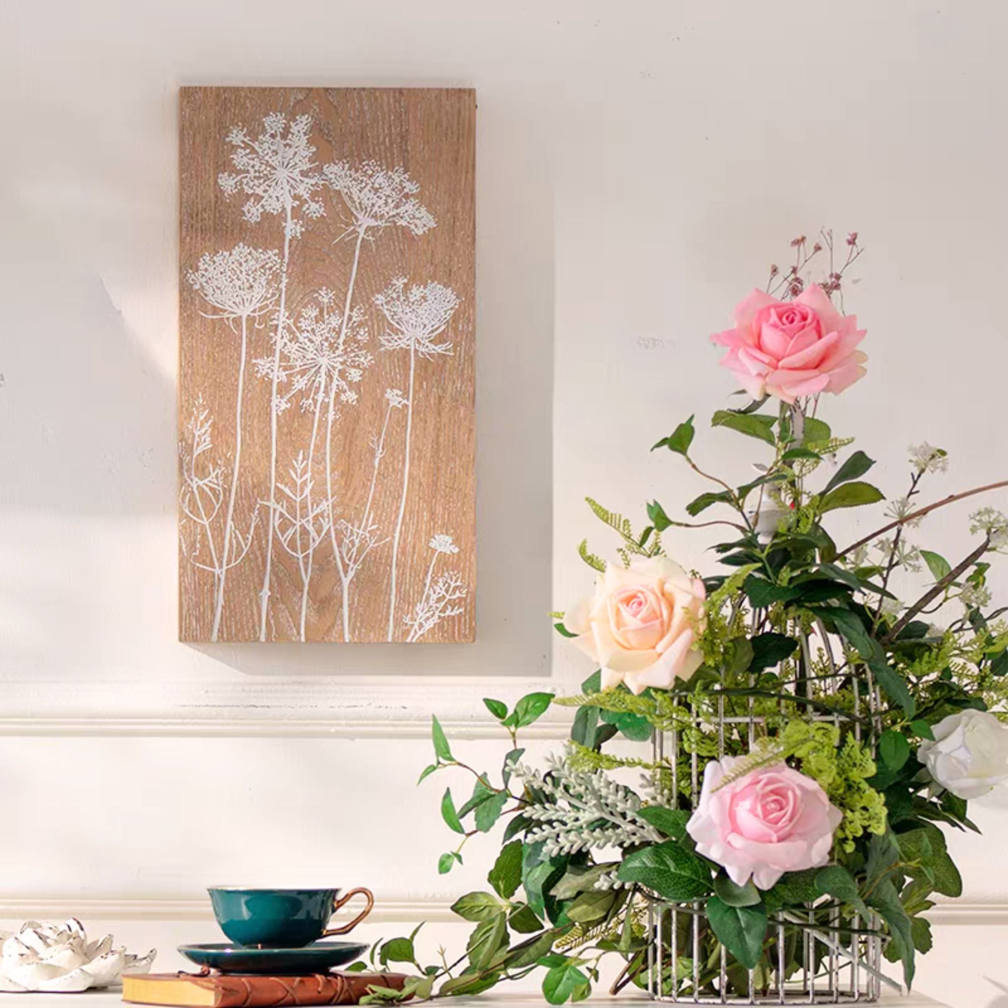 The Hughette wood block wall art styled above a mantel in a French country room.