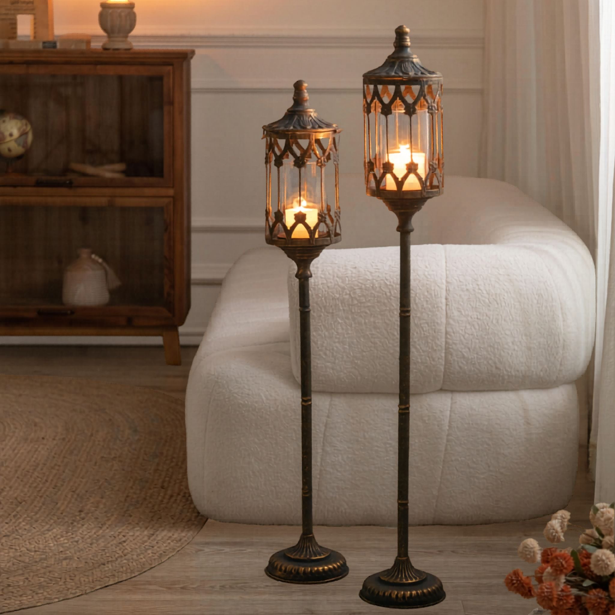 Two floor candle lanterns at two heights, the shorter companion sold separately