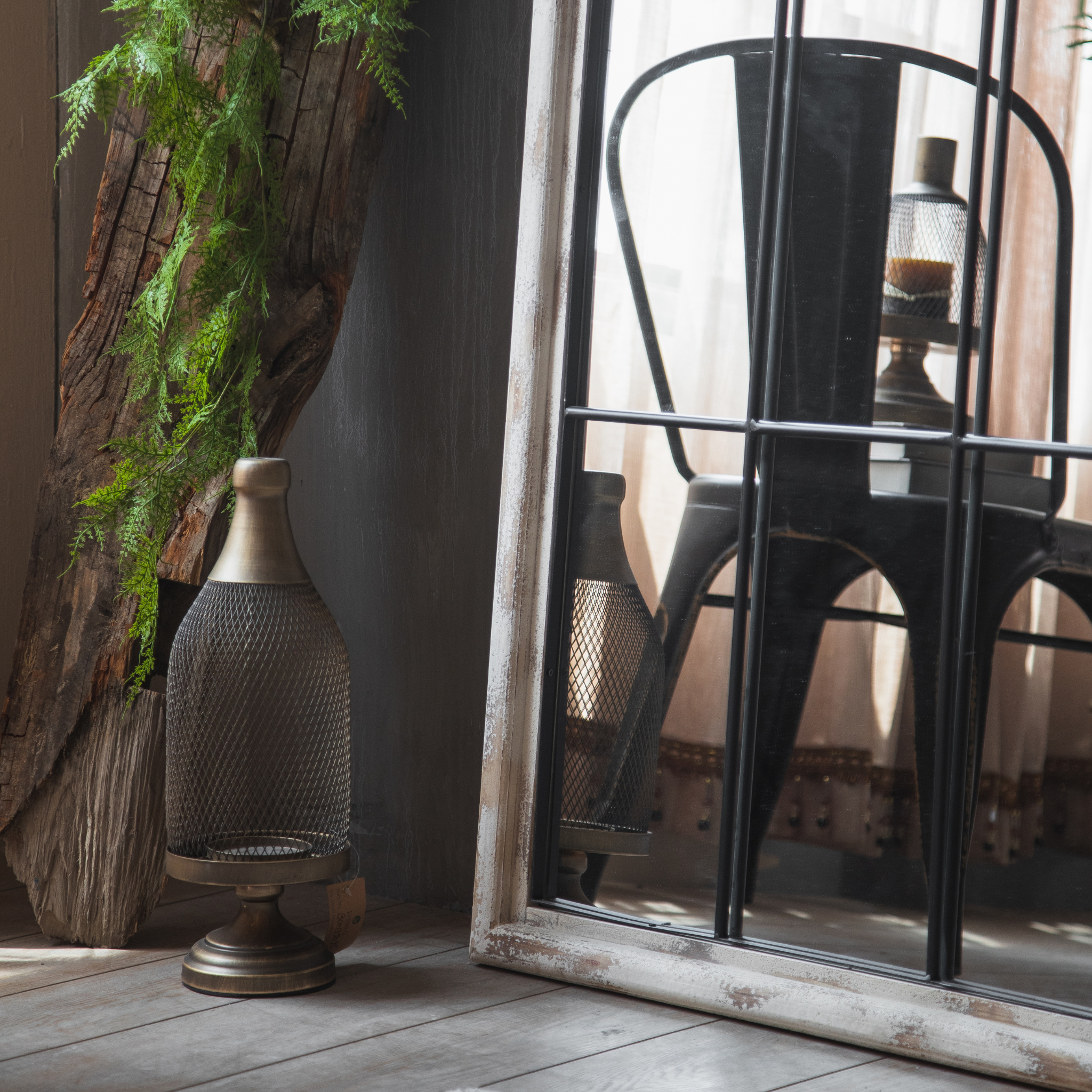 Laurent arch floor mirror styled in a French Provincial corner with woven lantern and timber accent