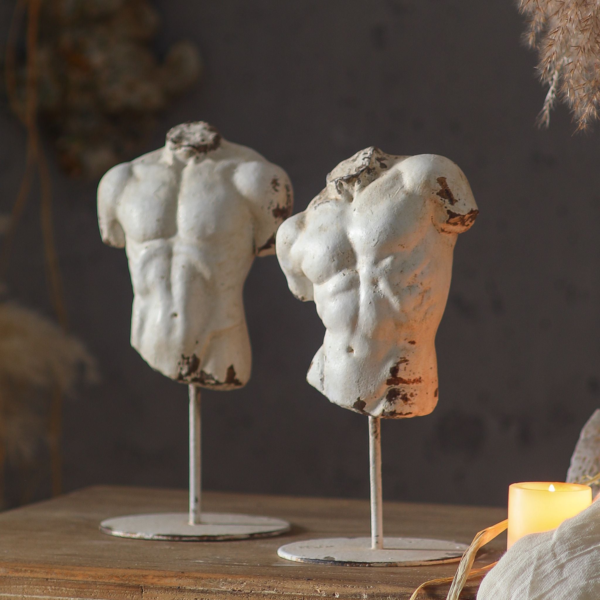Adonis on the right shown with companion torso Cassius on the left, front view with candle