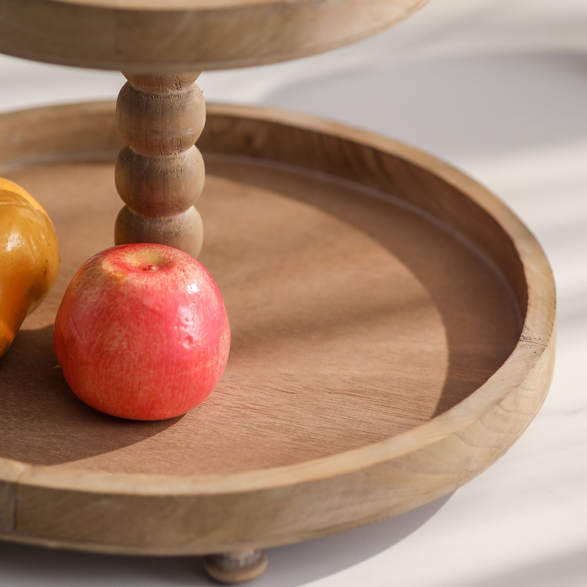 Mallory two tier tray stand lower tray showing the beaded stem and small ball feet.