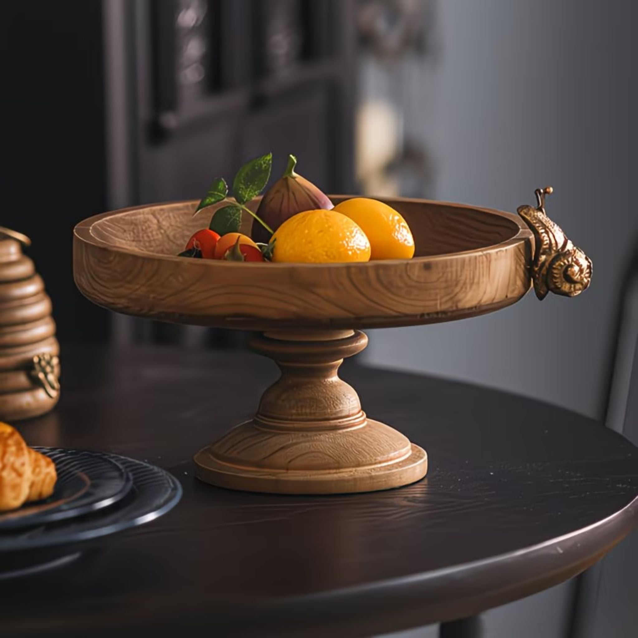 Ninette French Provincial footed wooden tray in natural timber with a cast brass snail on the rim. Hero.