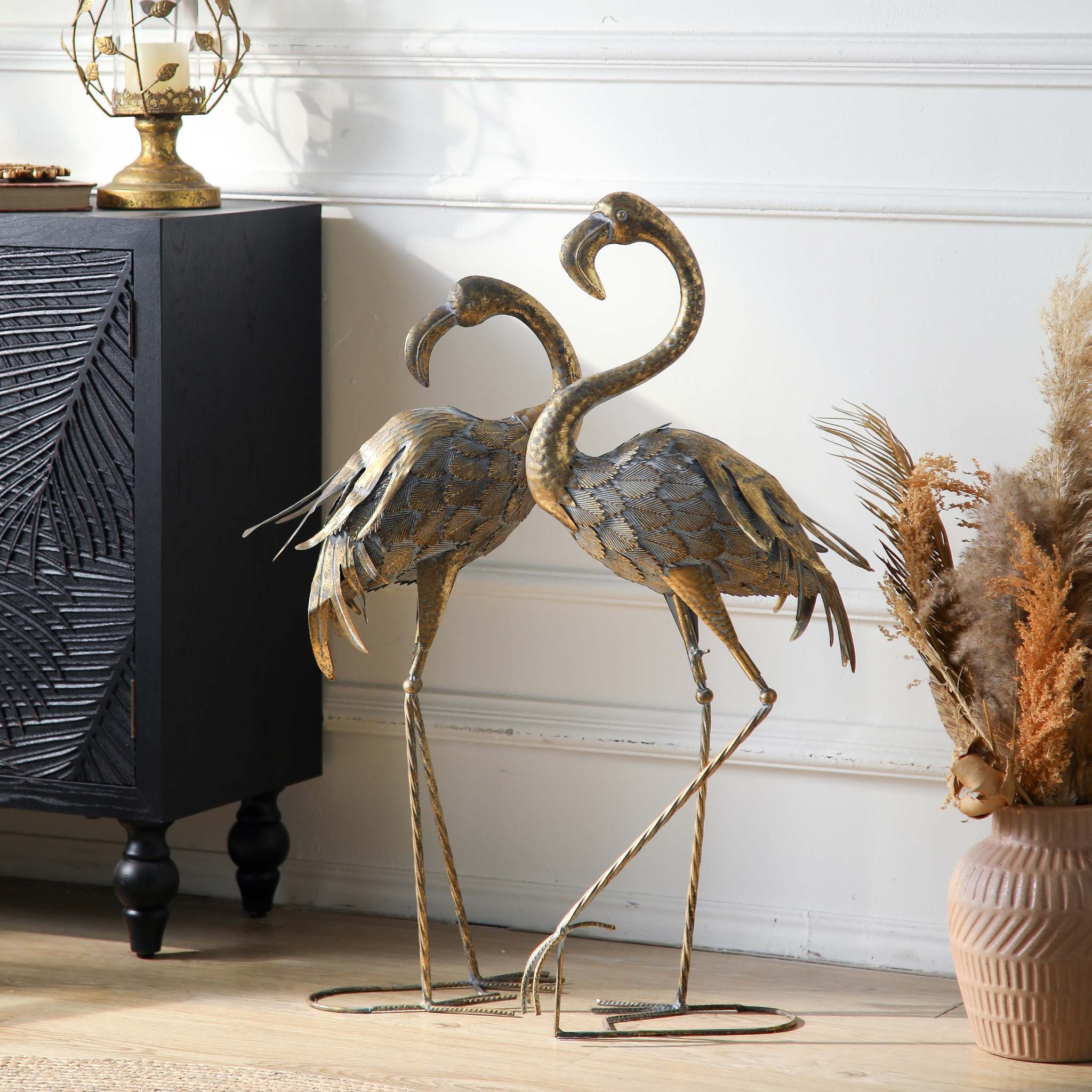 The Plumier Pair antique gold flamingo sculptures styled in a French Provincial living room