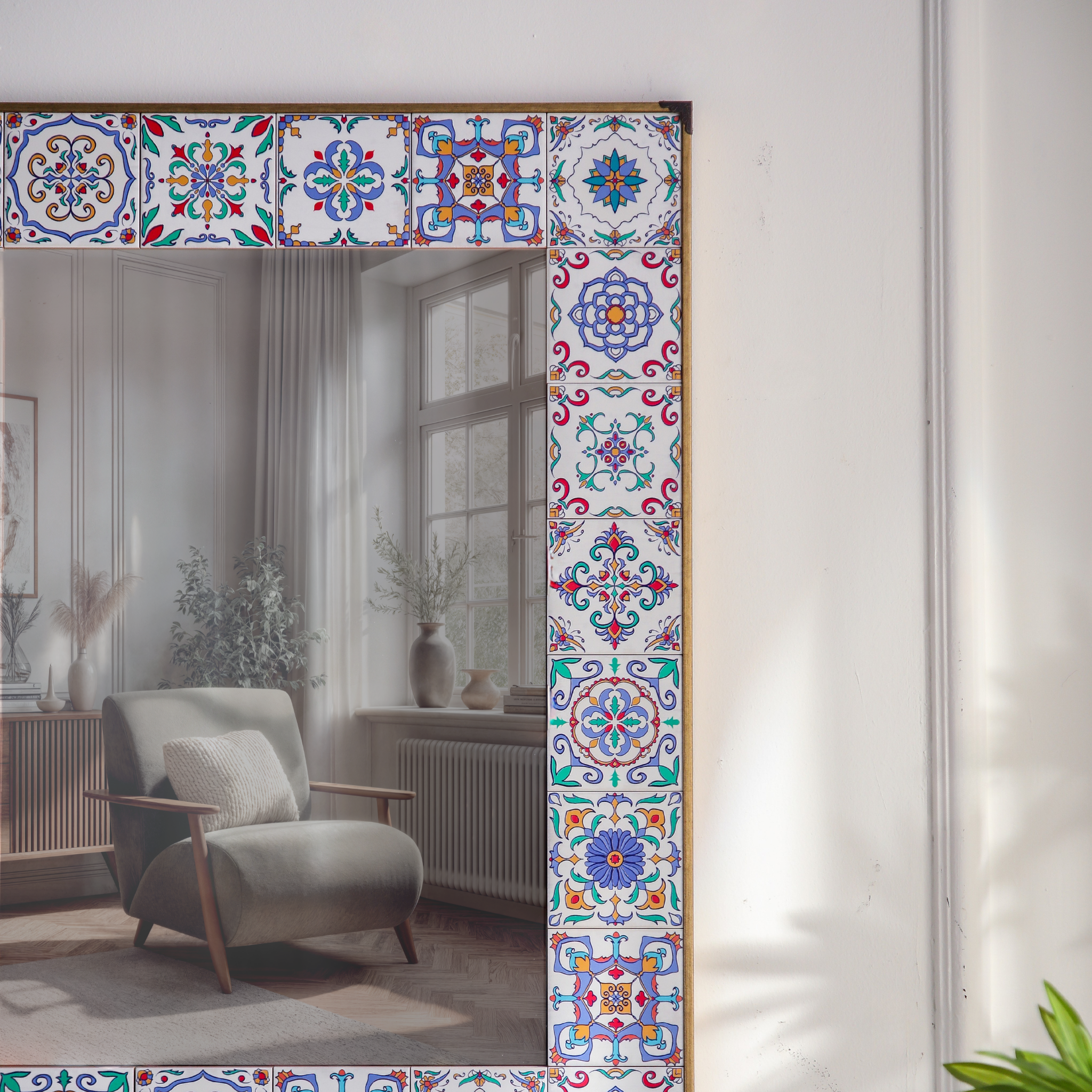 Salomé maiolica mirror close-up detail of hand-painted tile patterns in blue, red, green and ochre