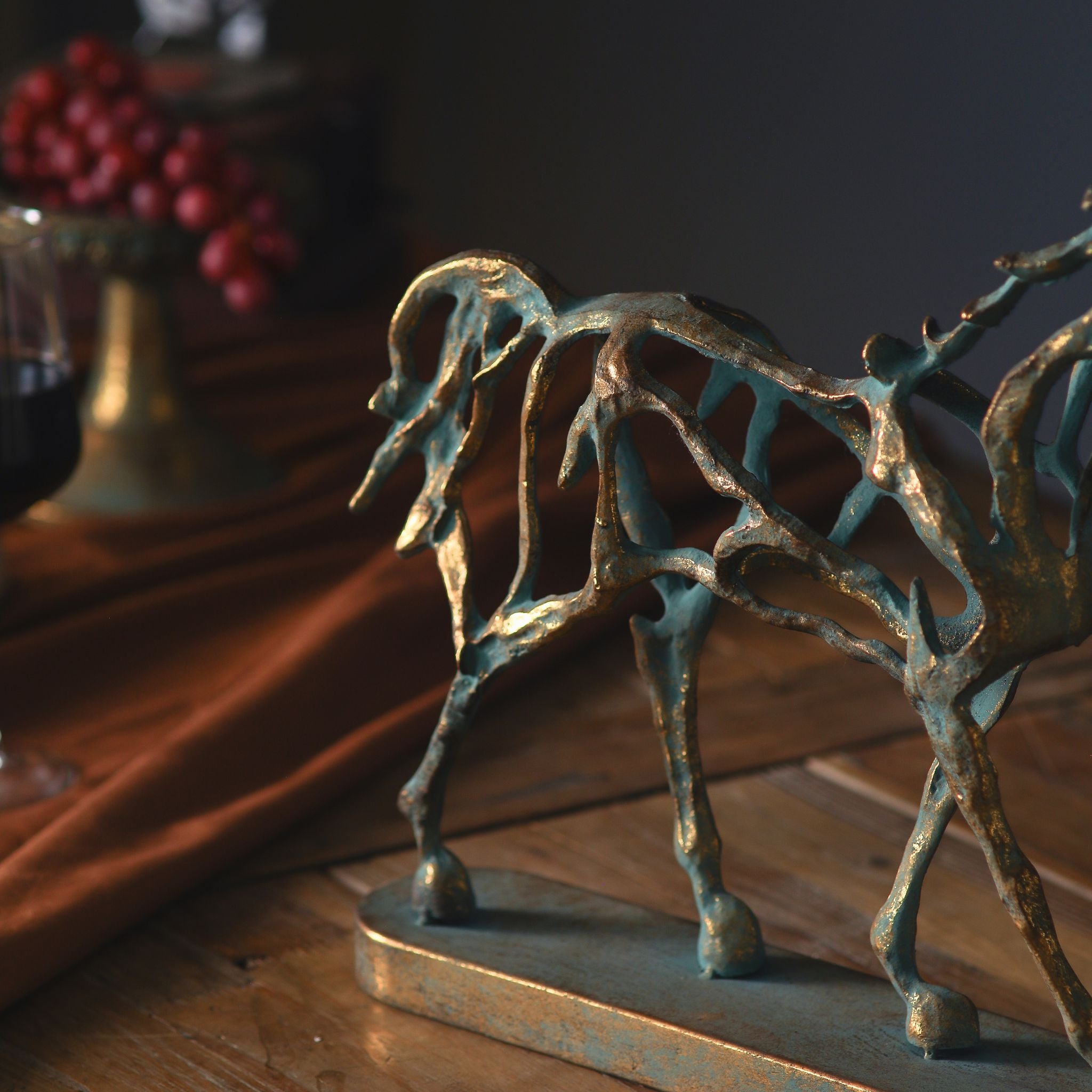 Close-up of the legs and oval base of the Jules horse sculpture