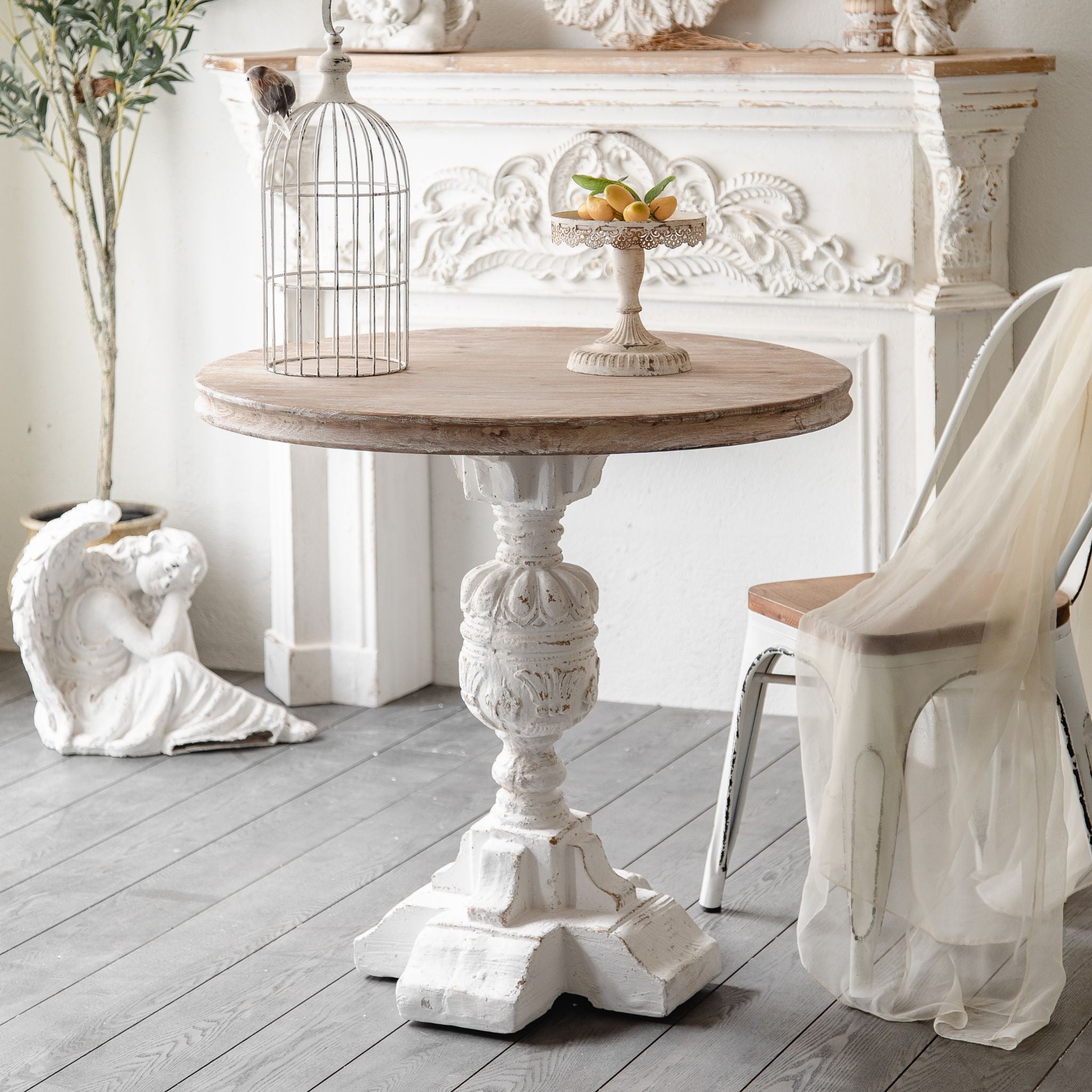 Bellagio table whitewashed fir timber top with candle, book, and teacup