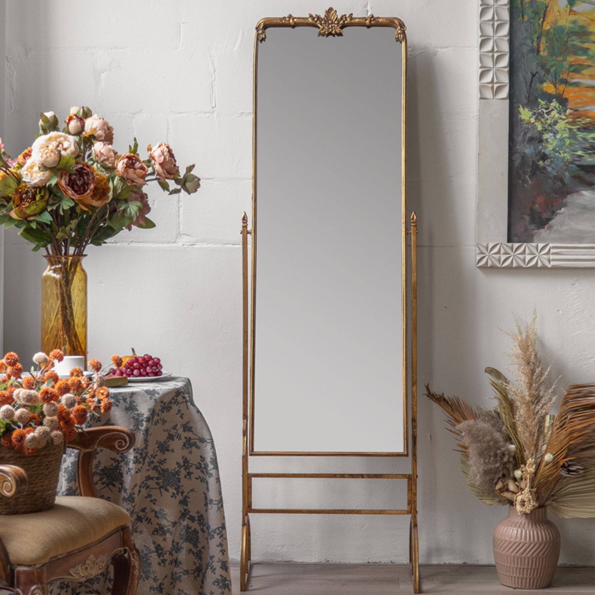 Close view of the floral crest and corner detail on the Sorrento cheval mirror