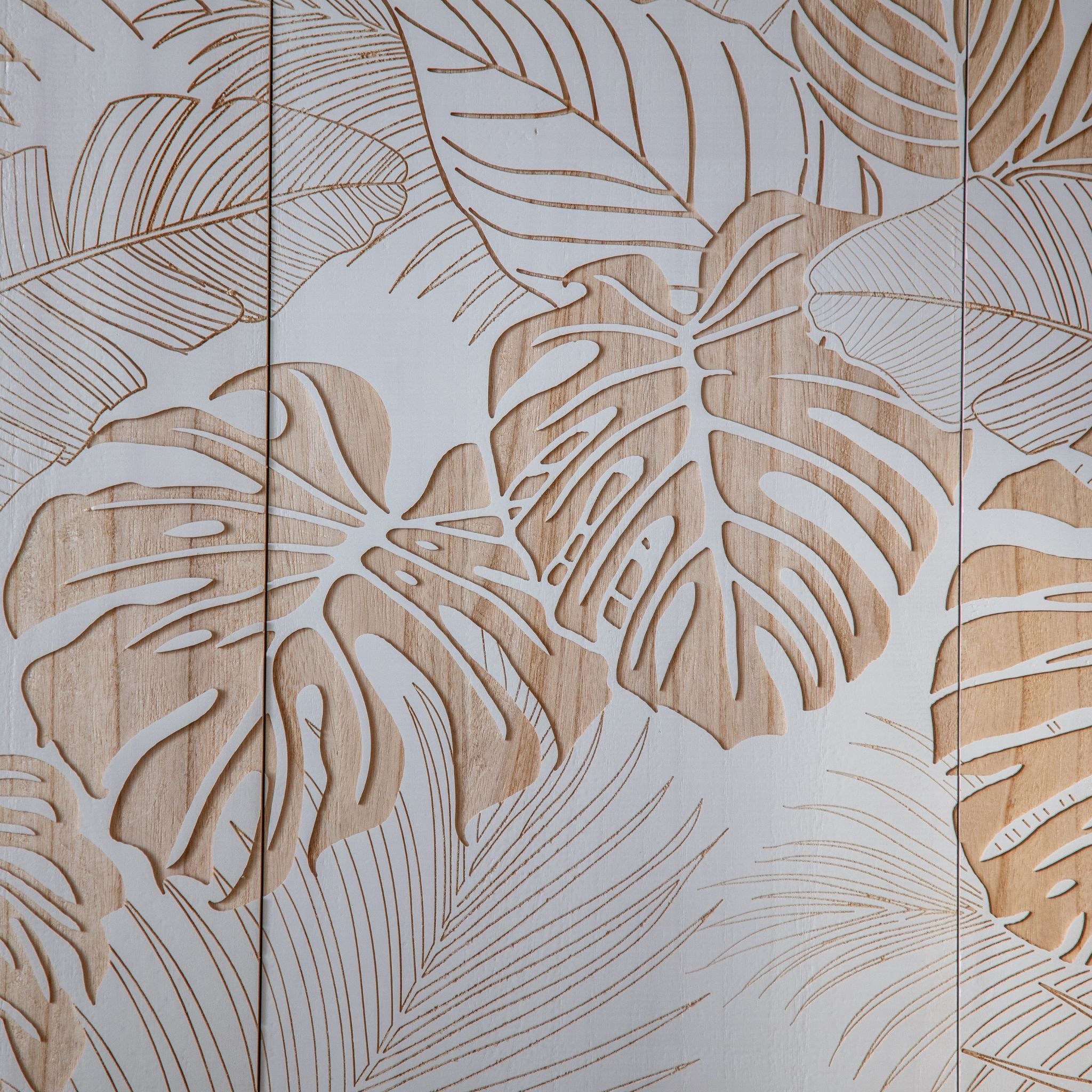 Sole wall panel set hung above a white sideboard with dried florals