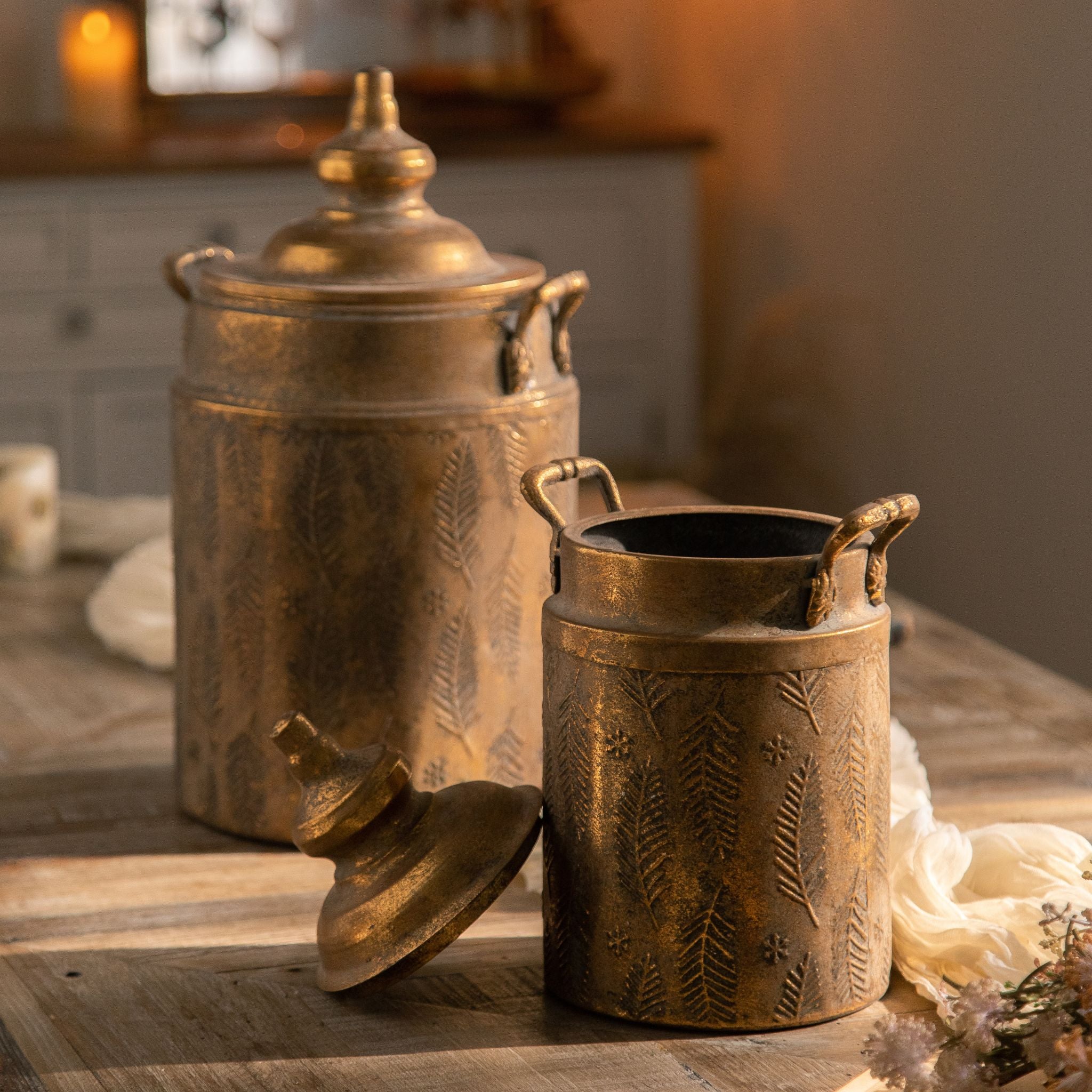 Close view of the embossed fern pattern and finial lid on the Rudi canister