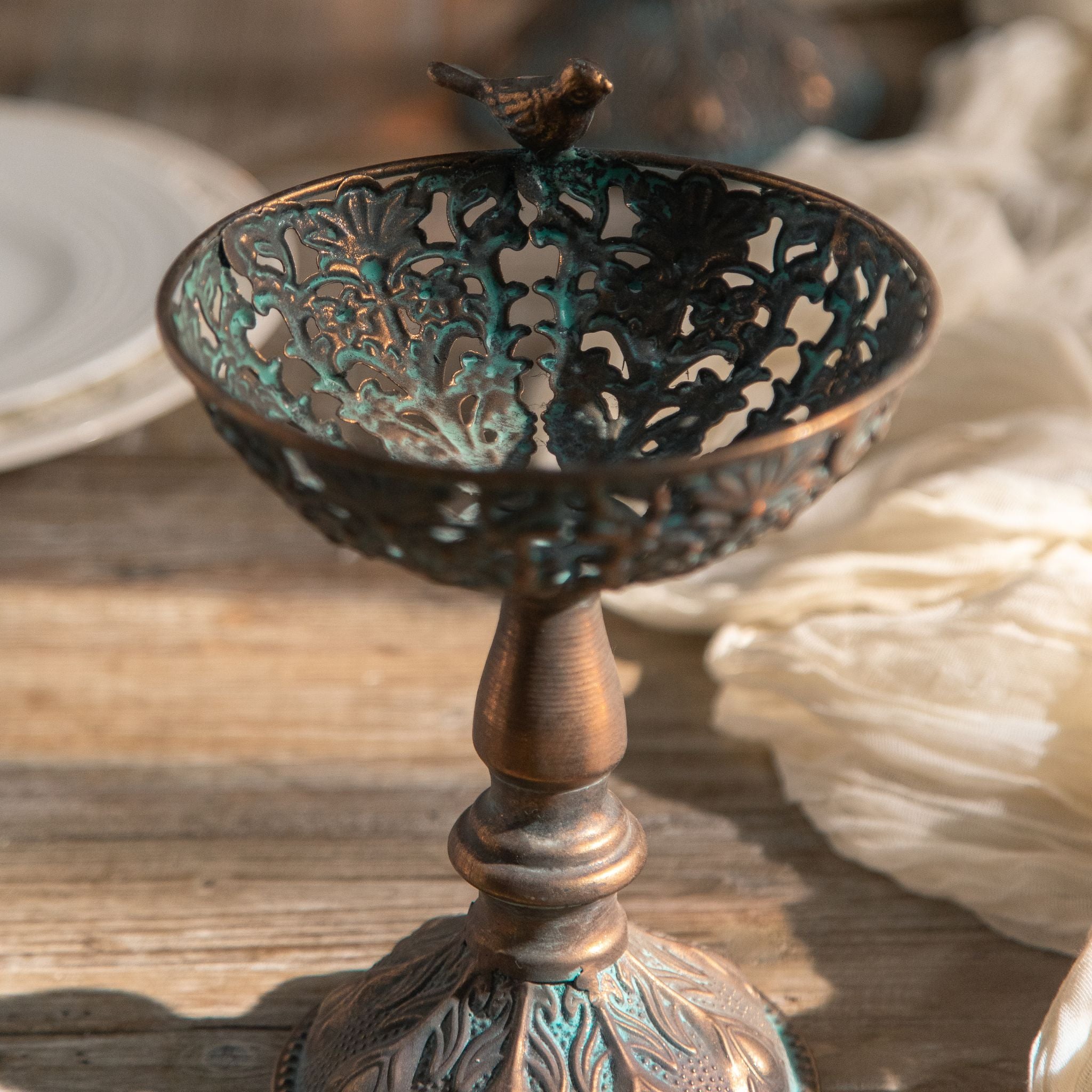 Zeno pedestal bowl with berries styled on a rustic dining table