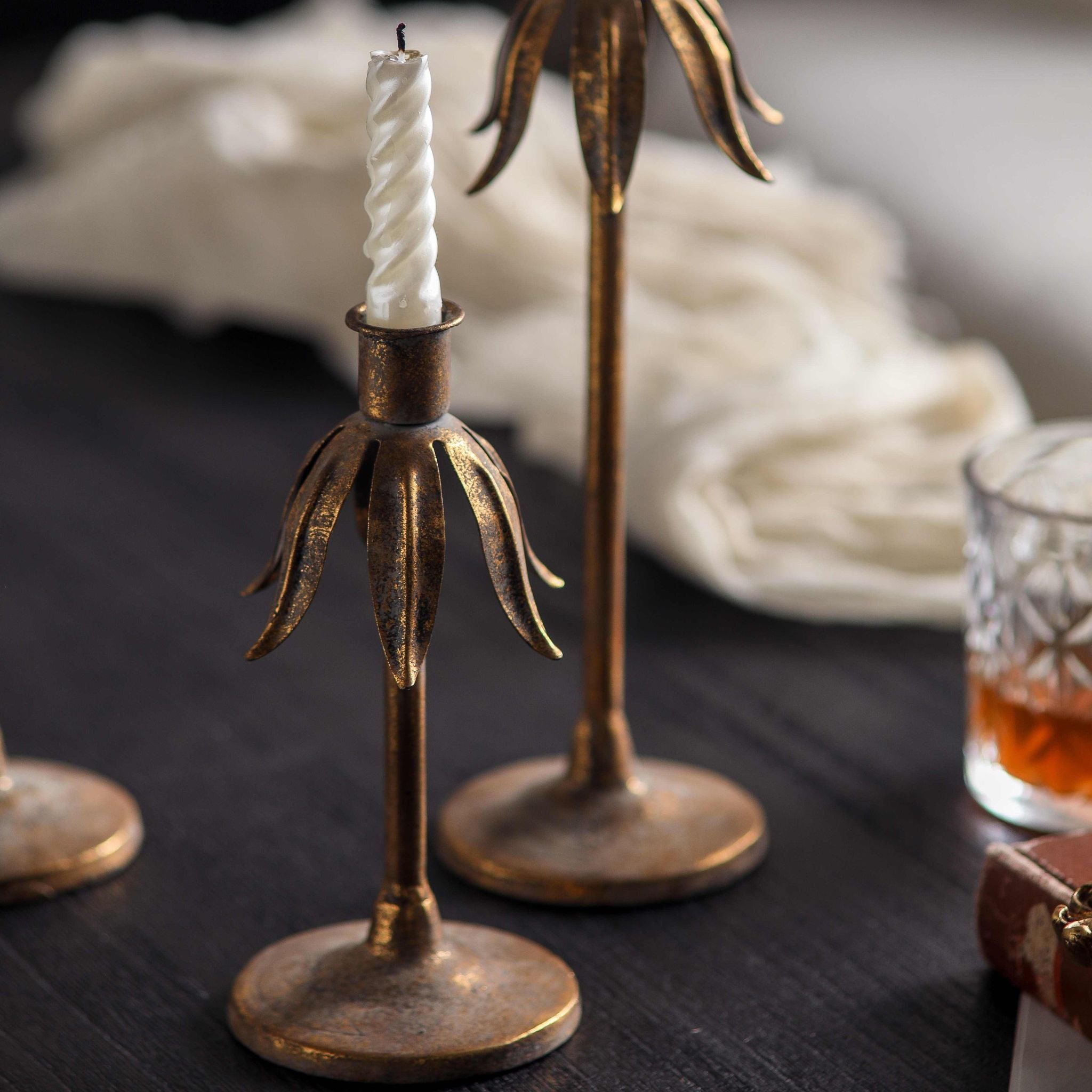 Close view of the downturned leaf crown beneath the candle cup on the Ines holder