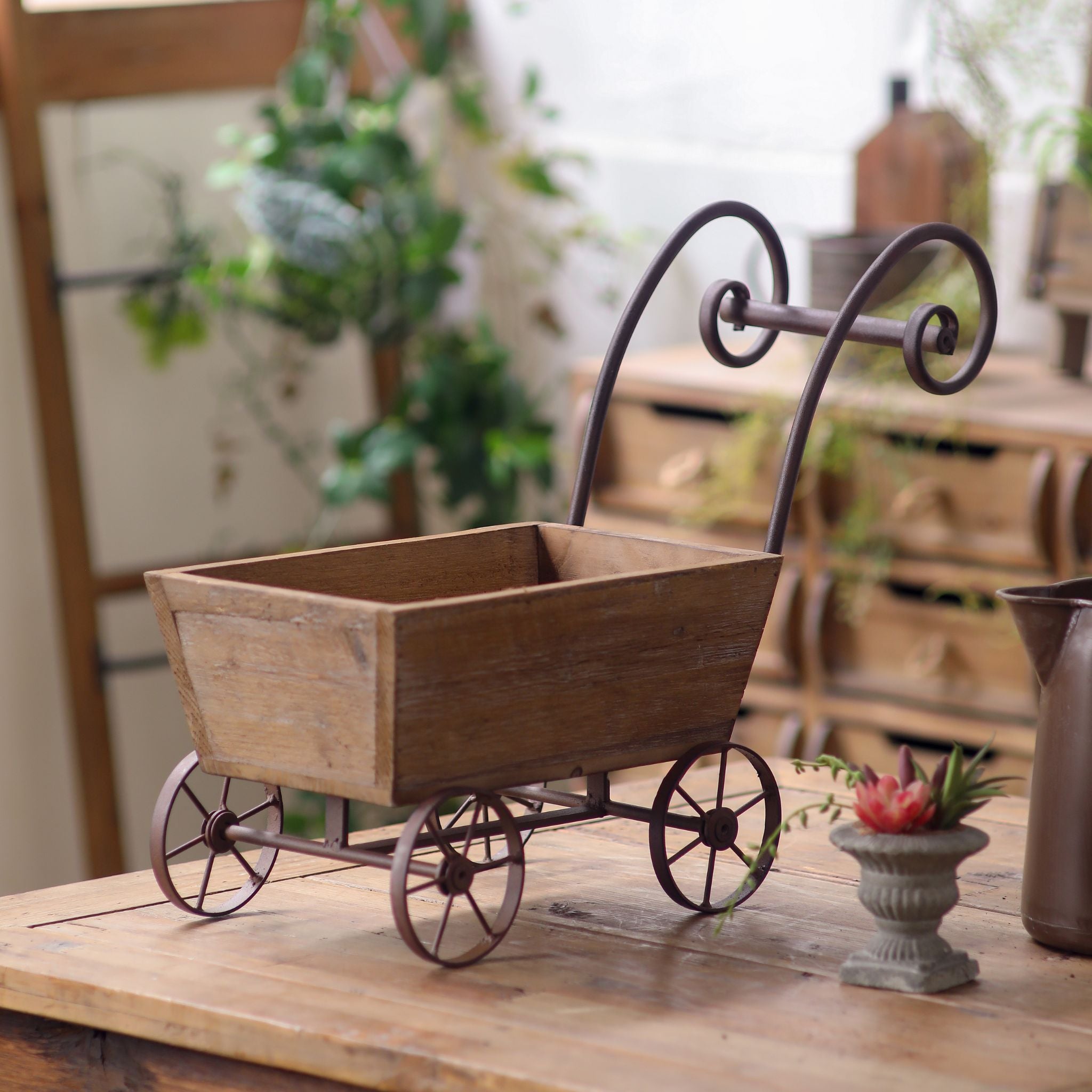 Close view of the spoked iron wheels and rusted finish on the Paloma wagon