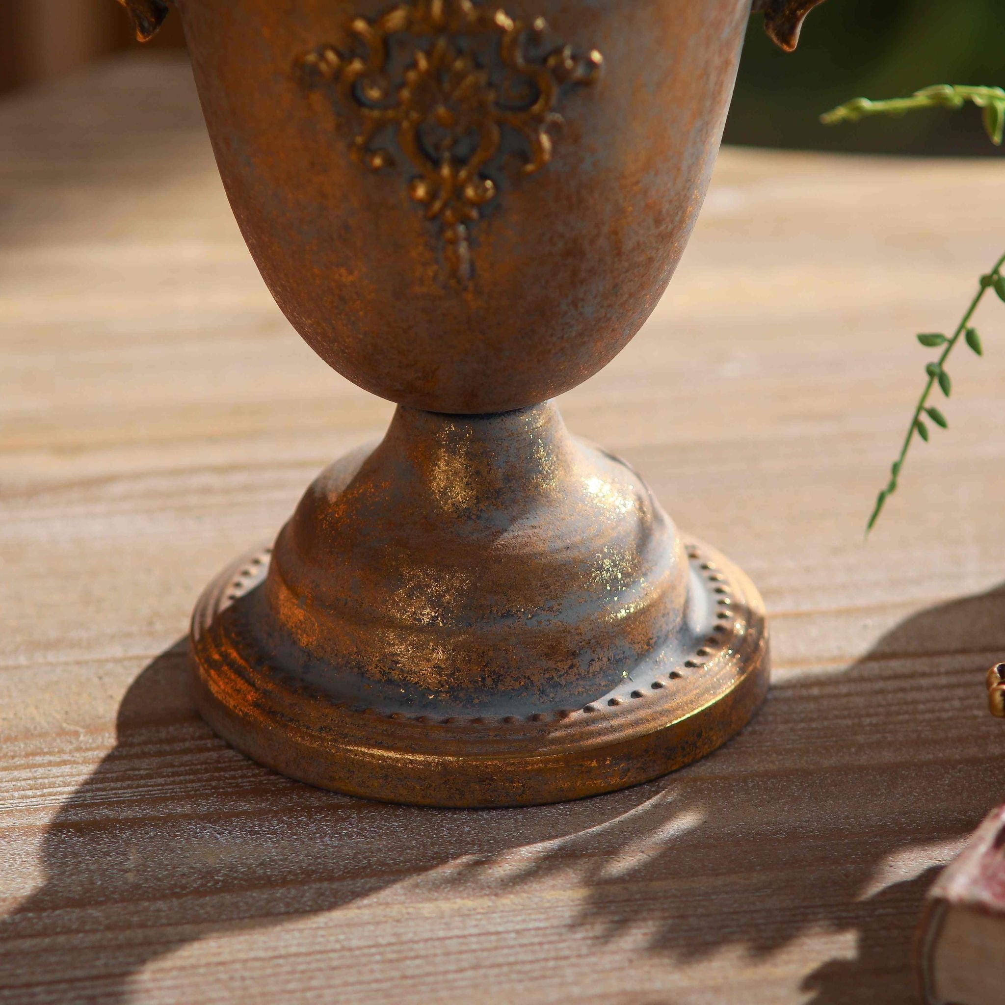 Detail of the turned pedestal foot and beaded rim on the Bruno urn planter